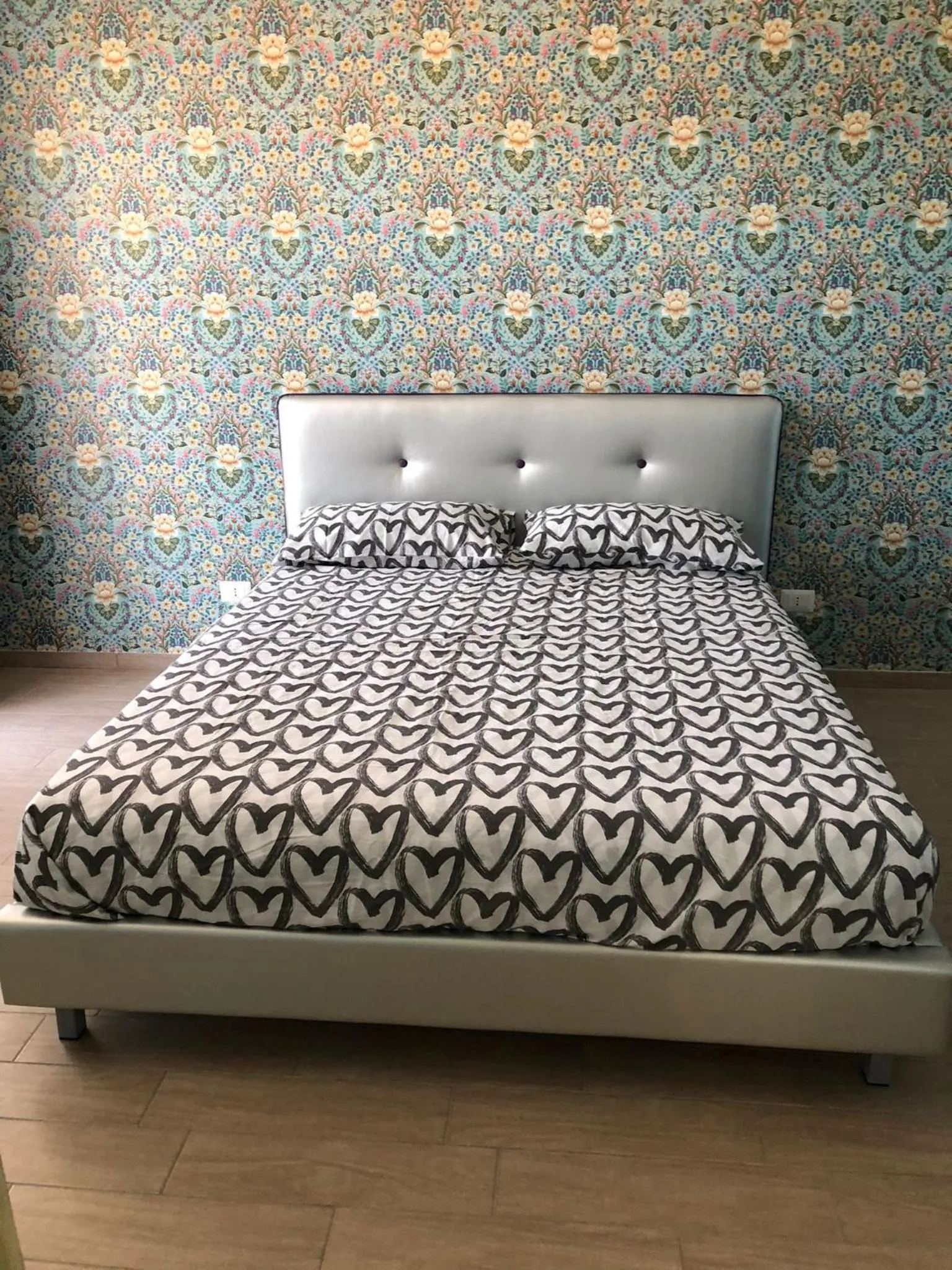 Bed in E&C Suites Roma