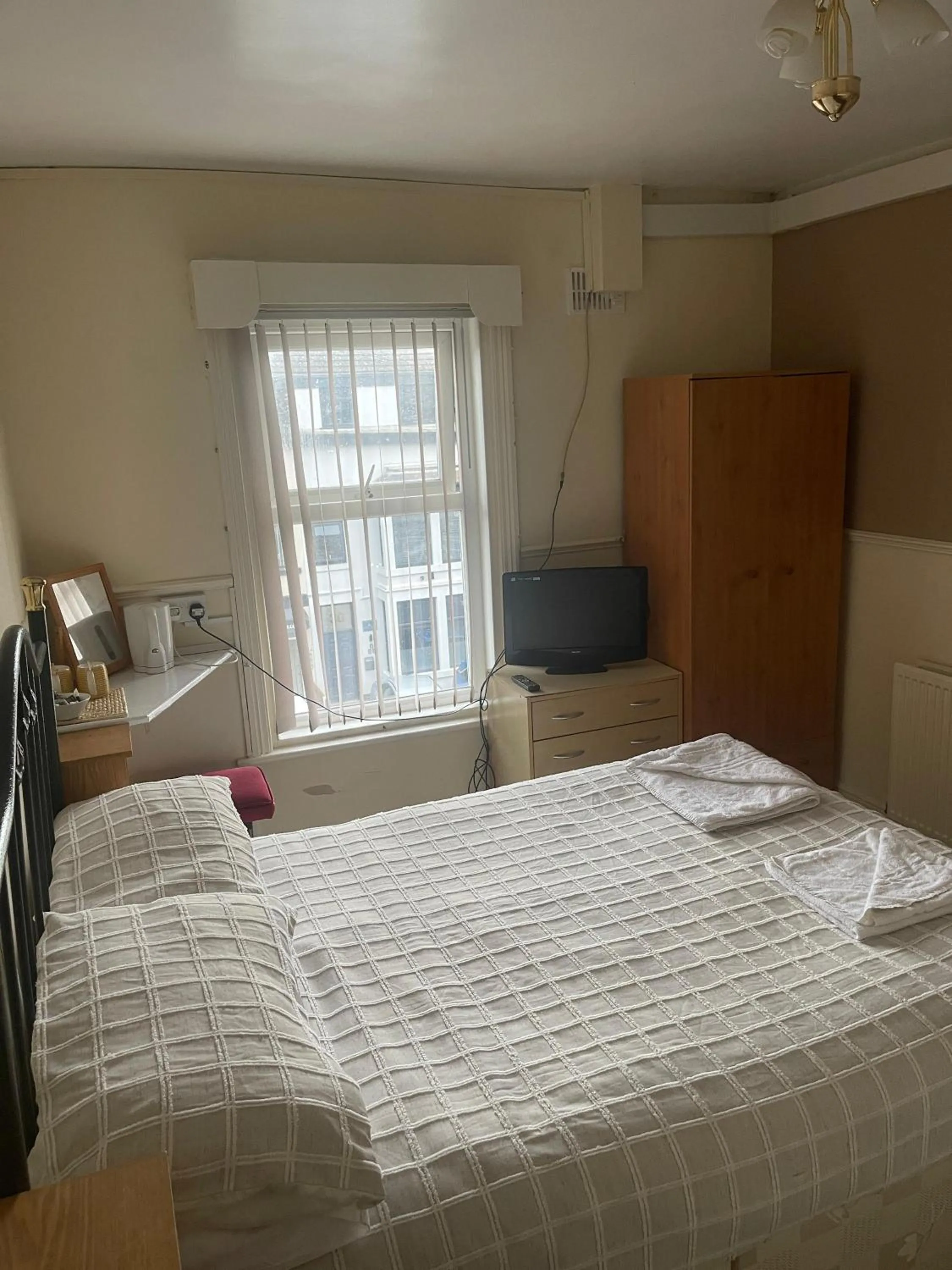 Bed in White Moon Hotel