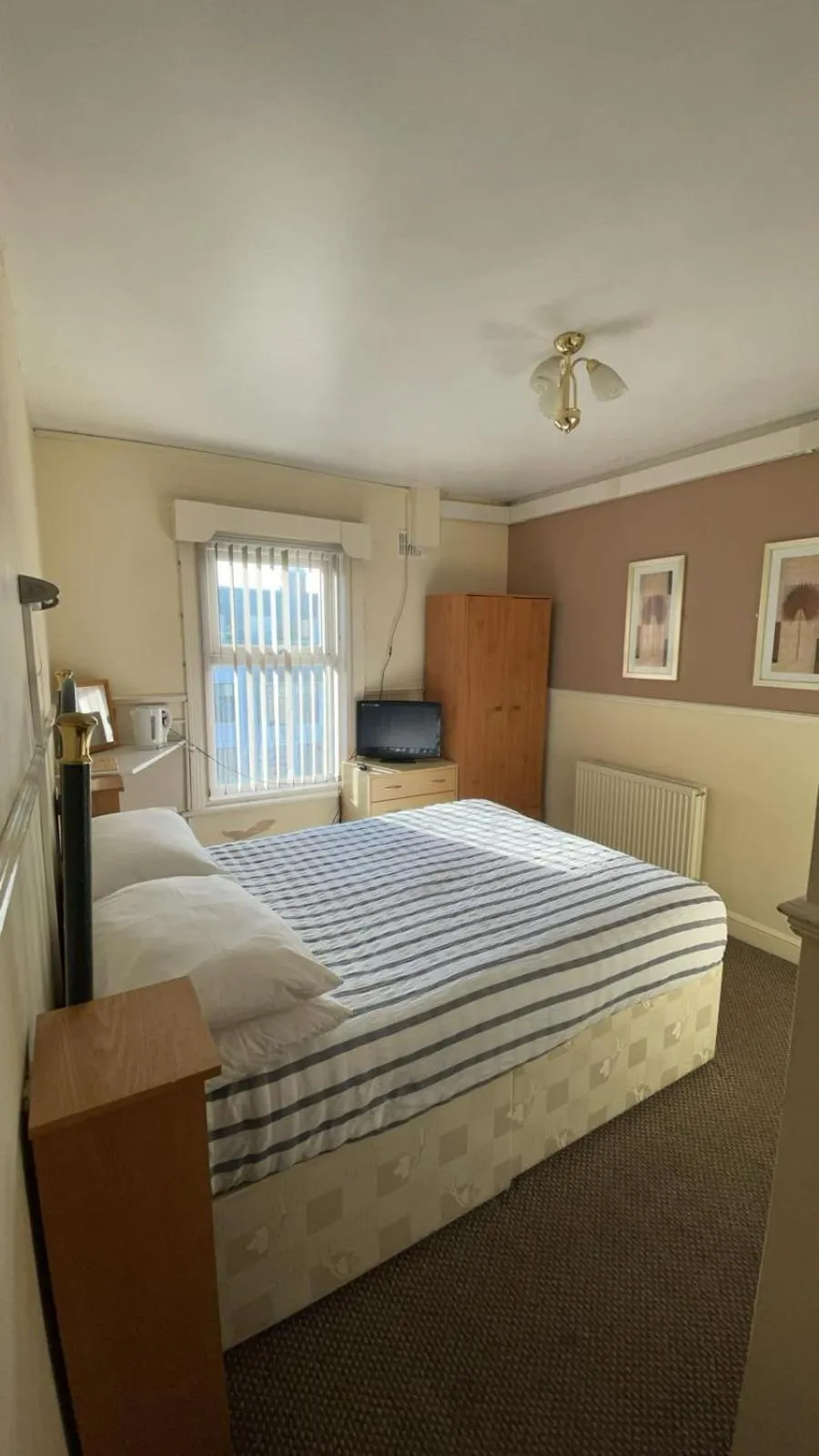 Bed in White Moon Hotel