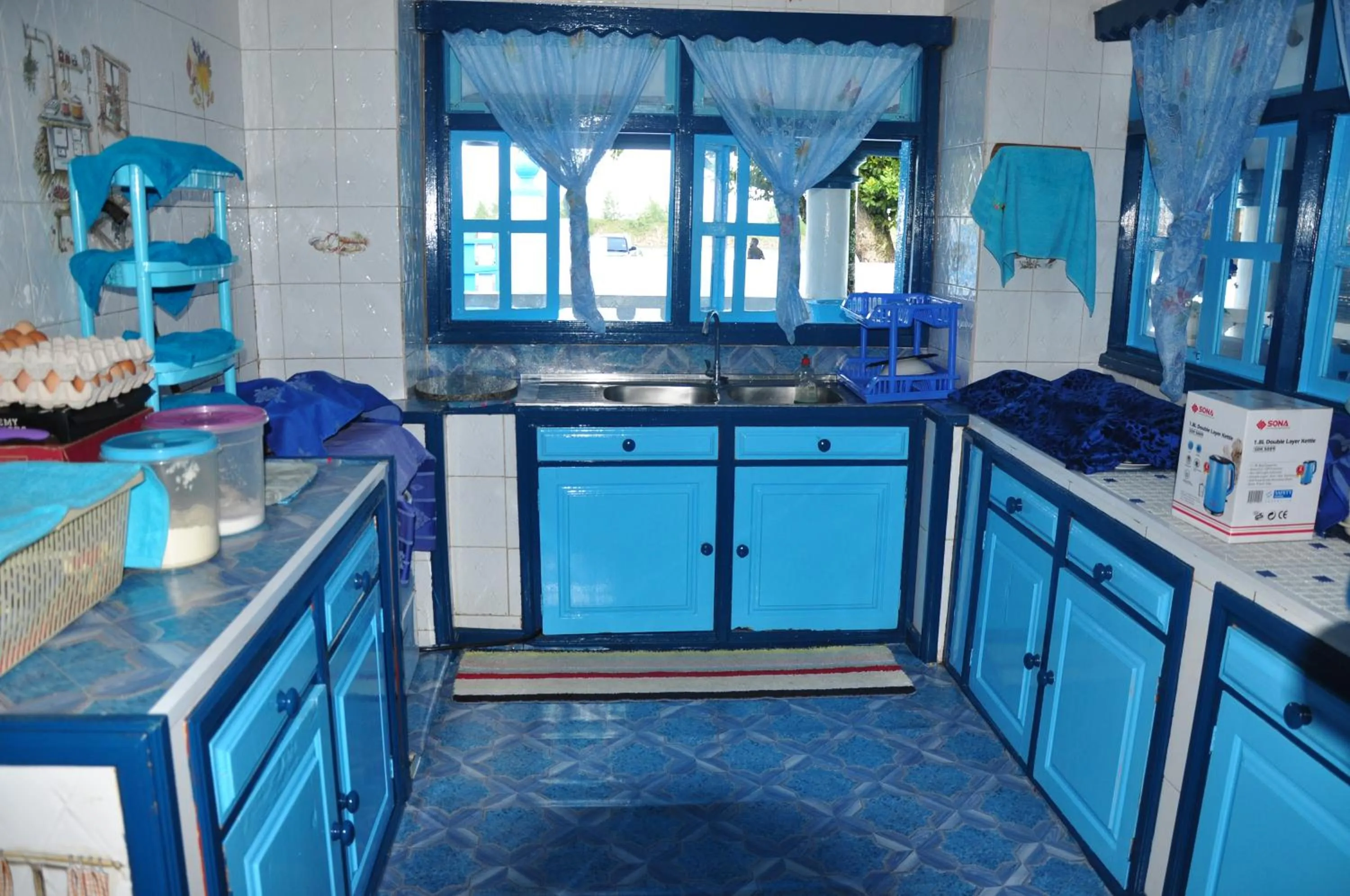 Kitchen or kitchenette in Le Chateau Bleu