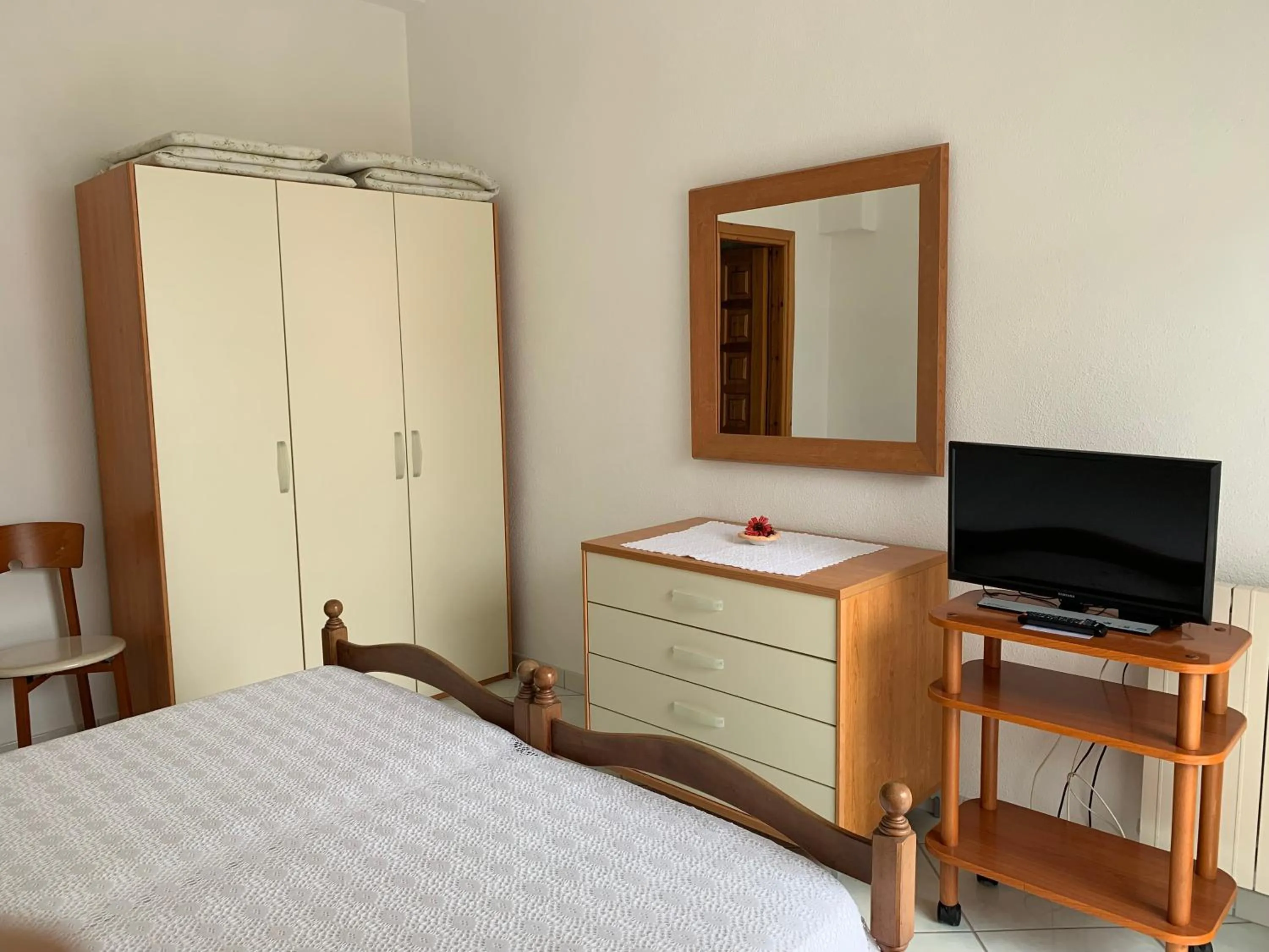 Bed in Pensione Casa Verde