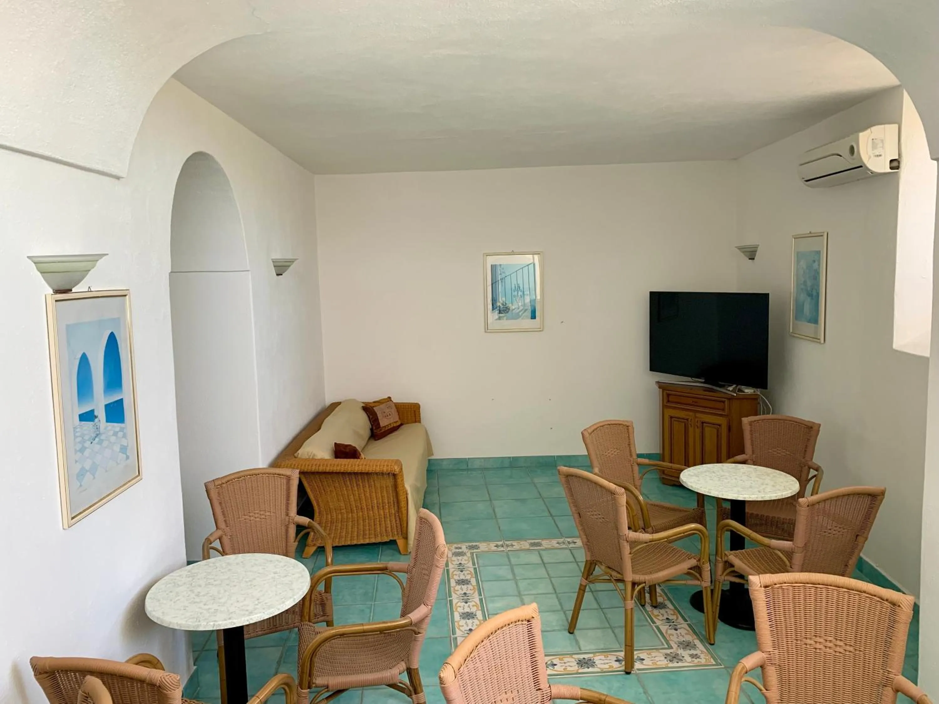 Communal lounge/ TV room in Pensione Casa Verde