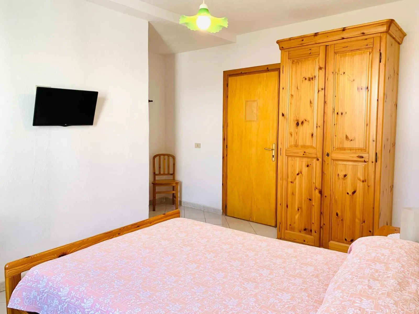 Bed in Pensione Casa Verde