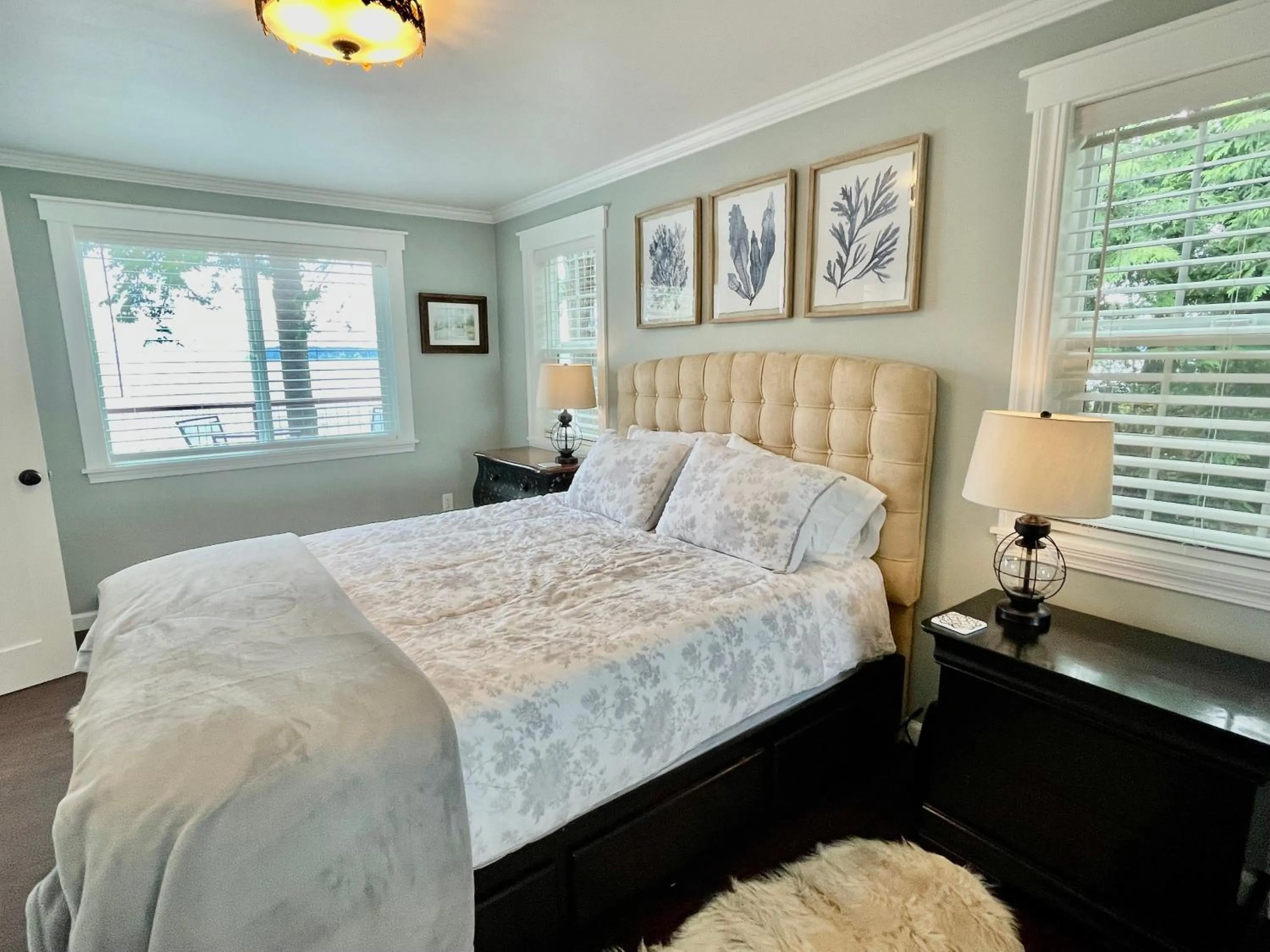 Bed in Puget Sound Chic Romantic Cottage with Private Beach Access & Gated Entry