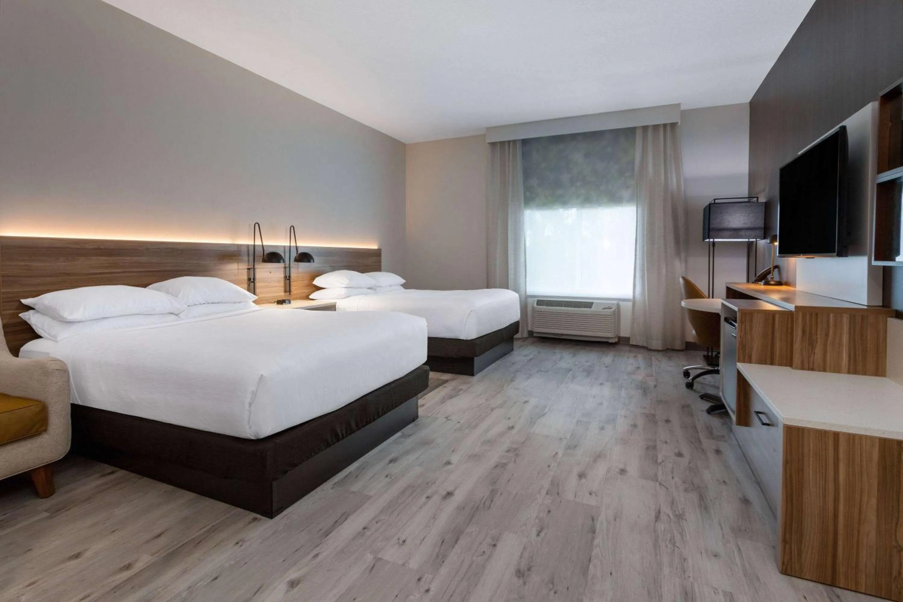 Photo of the whole room, Bed in Wyndham Garden Orlando Airport - Free Airport Shuttle