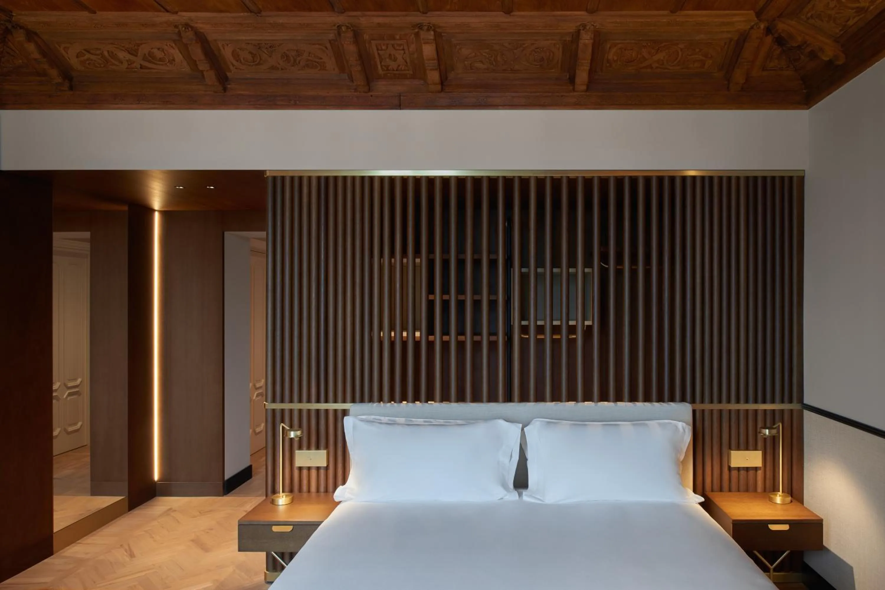 Bed in Amabilia Suites