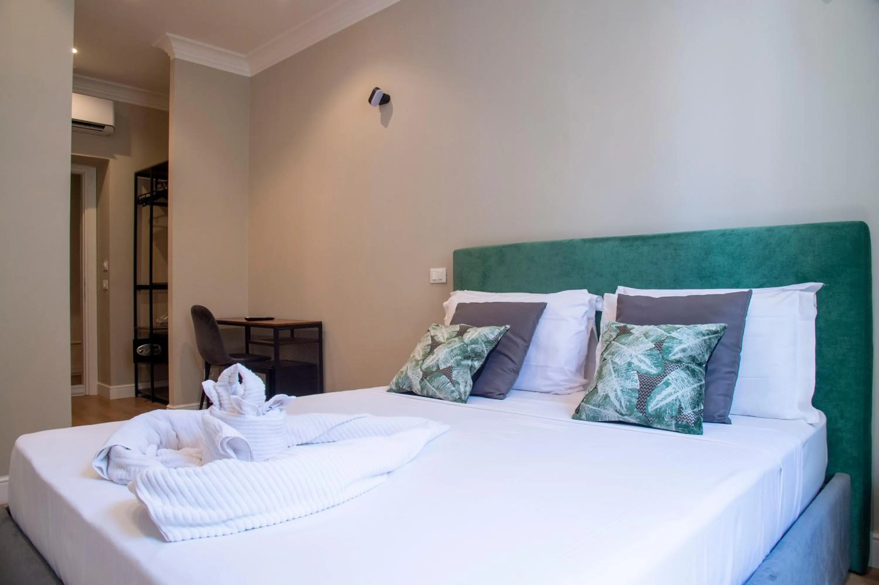 Bed in AD Suites Tritone