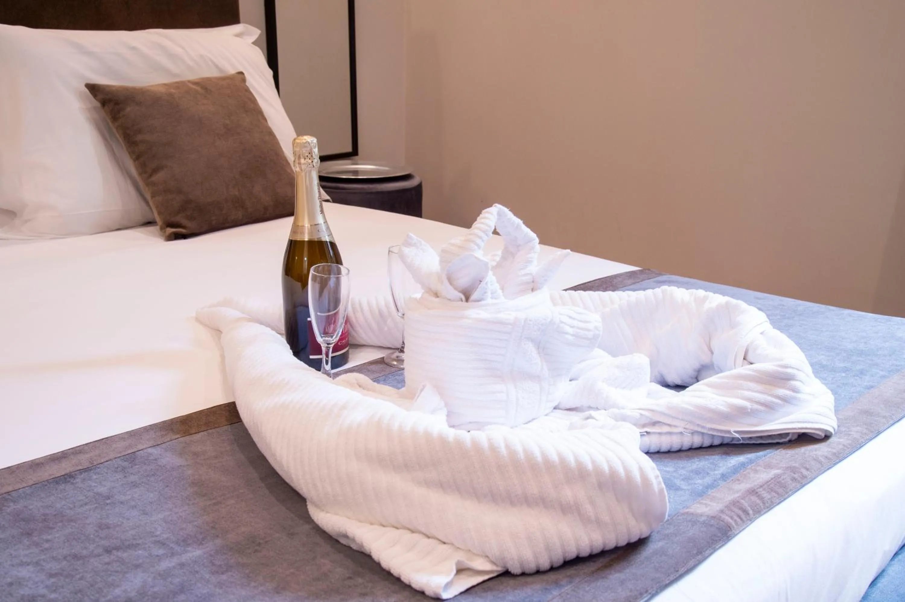 Bed in AD Suites Tritone