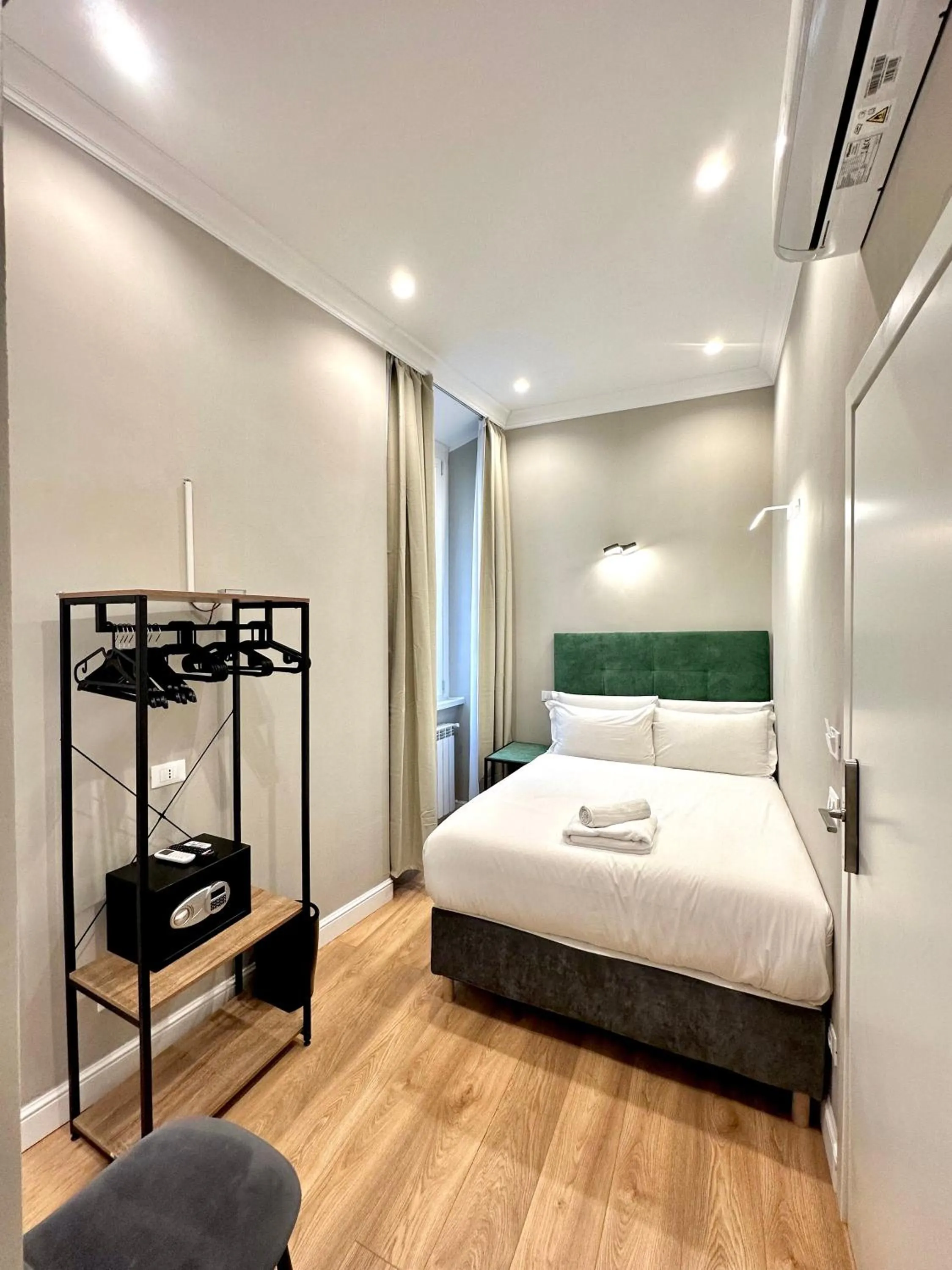 Bed in AD Suites Tritone