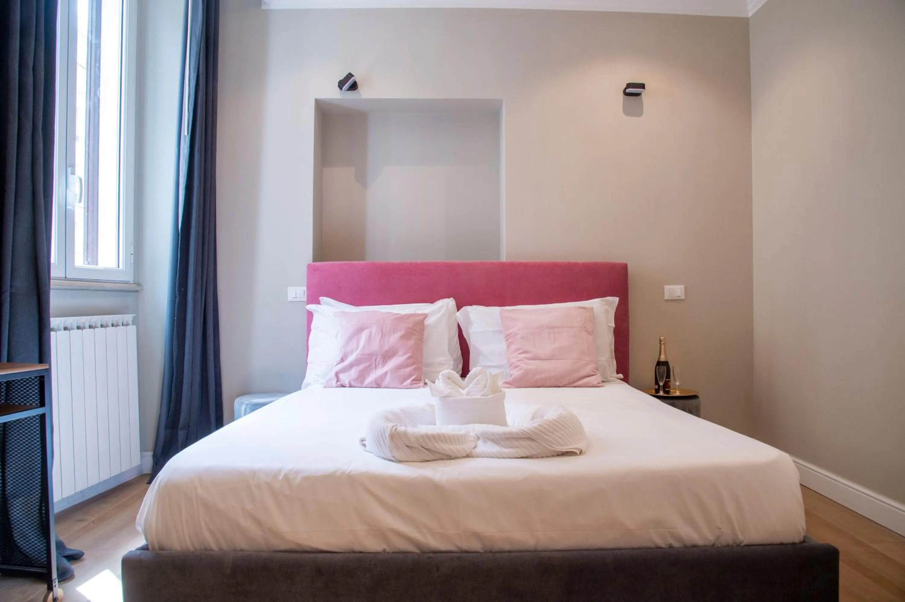 Bed in AD Suites Tritone