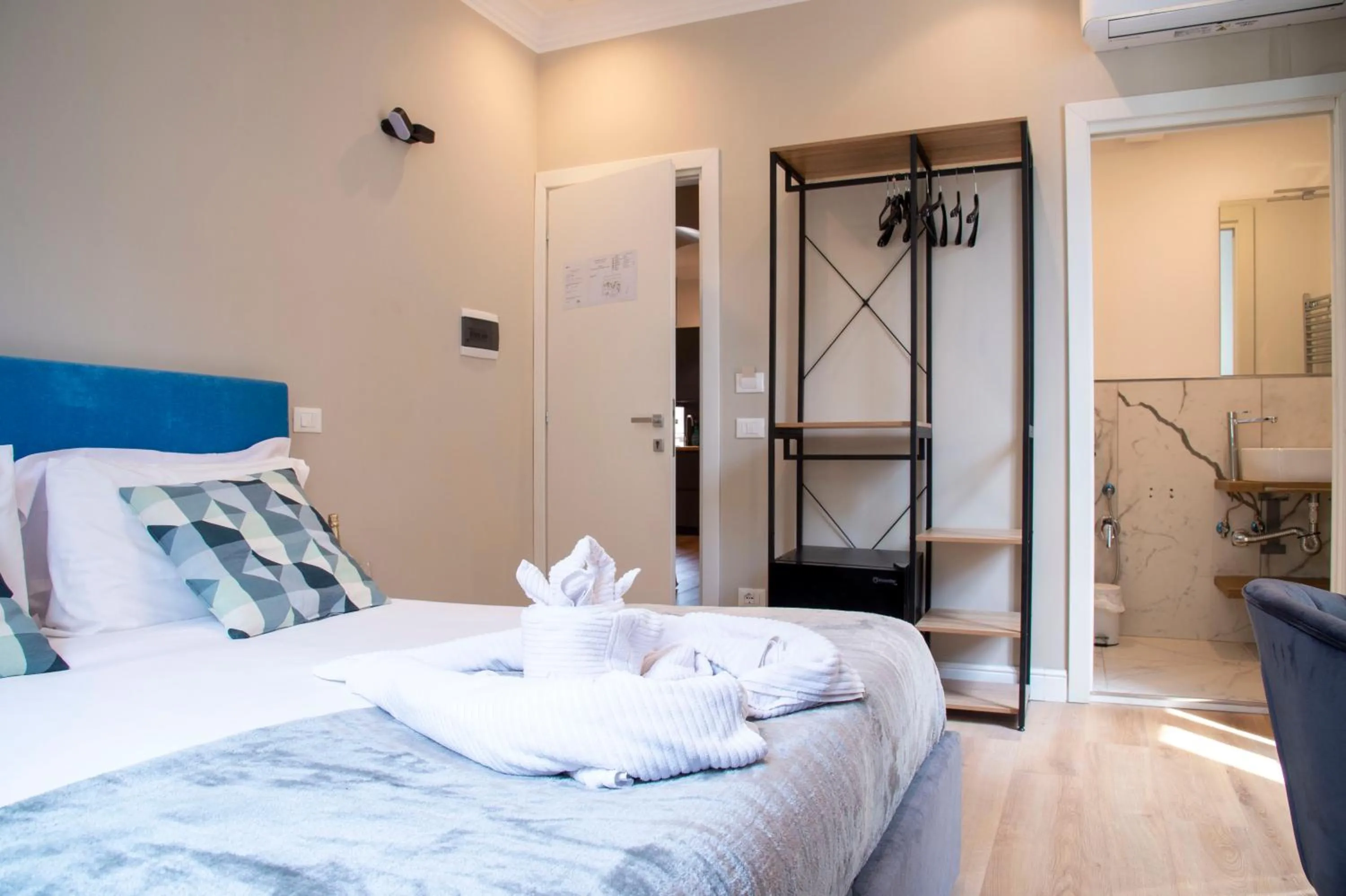 Bed in AD Suites Tritone