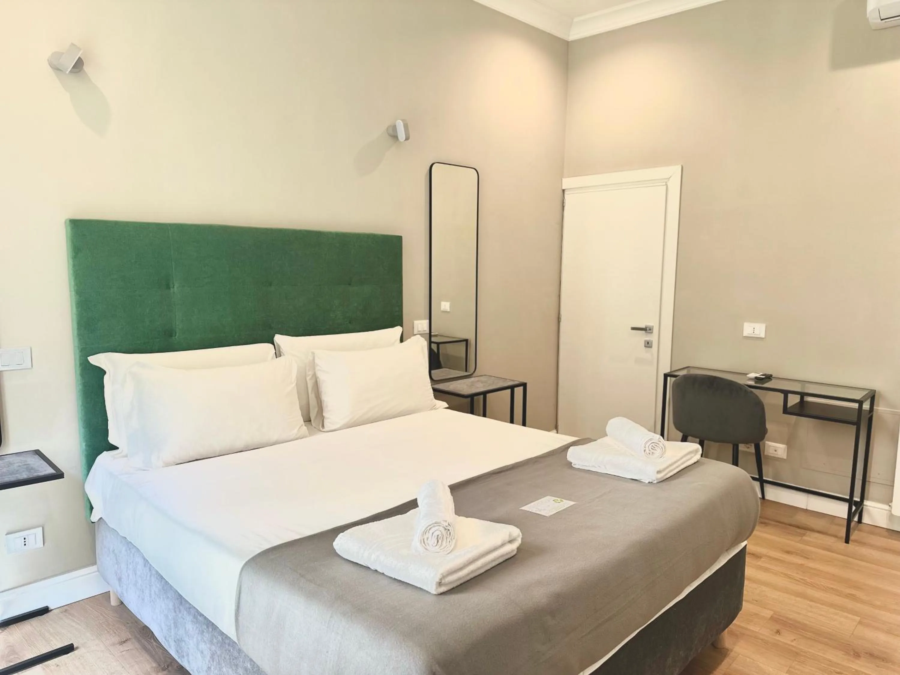 Bed in AD Suites Tritone