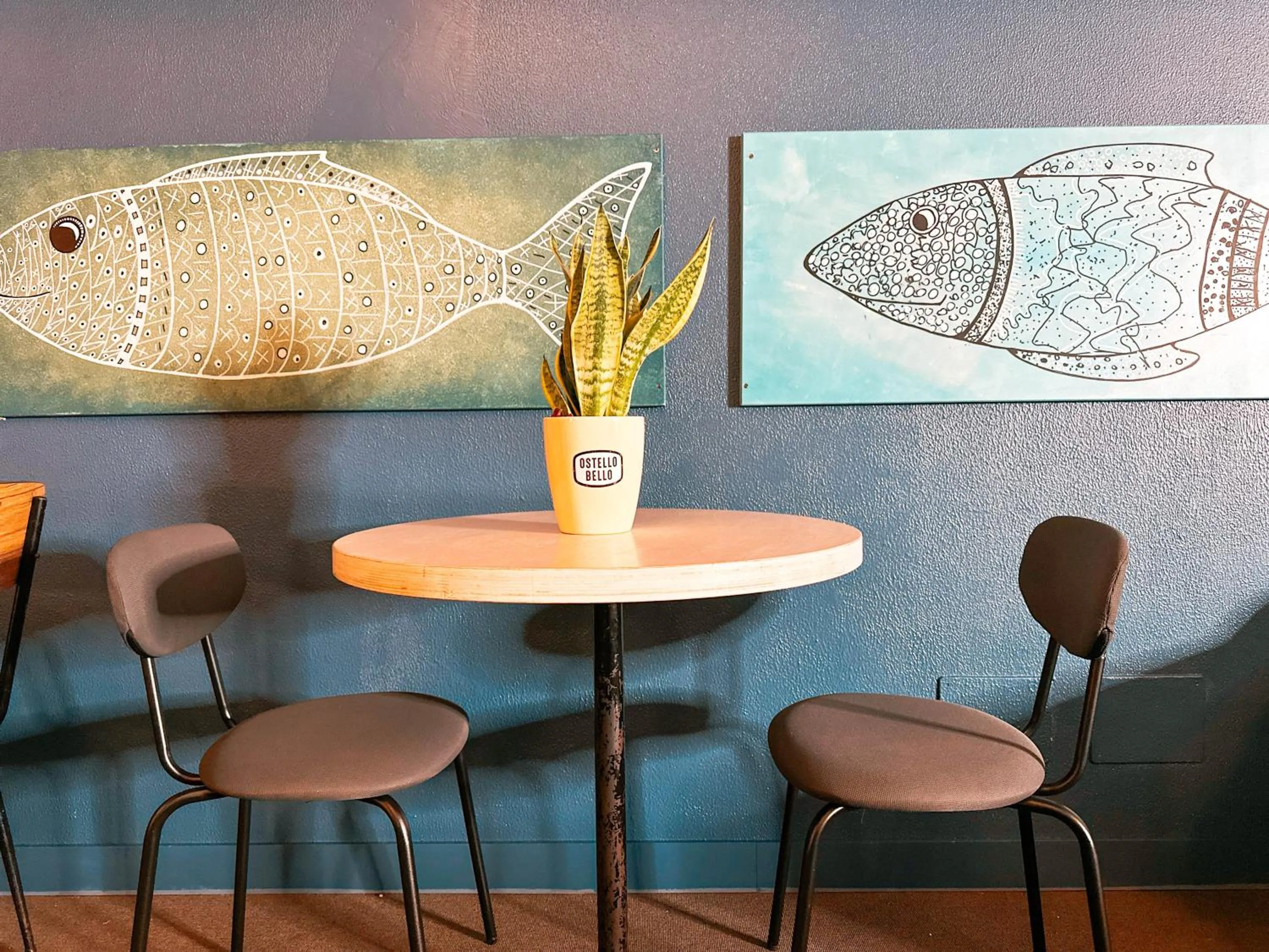 Seating area in Ostello Bello Genova