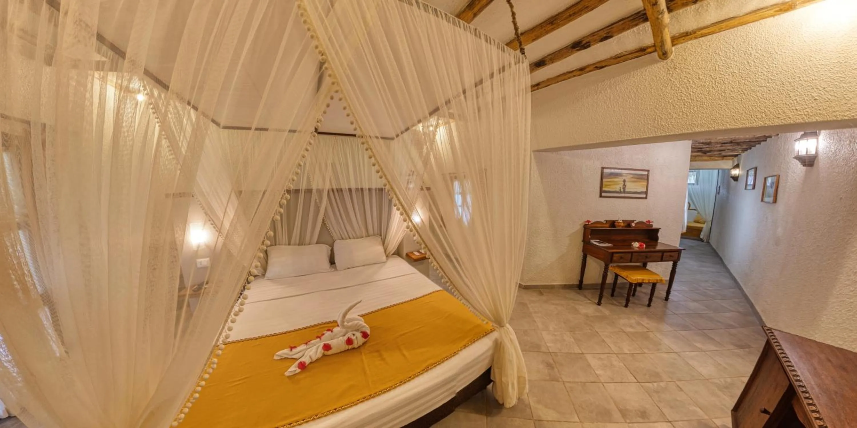 Bed in Karafuu Beach Resort & Spa