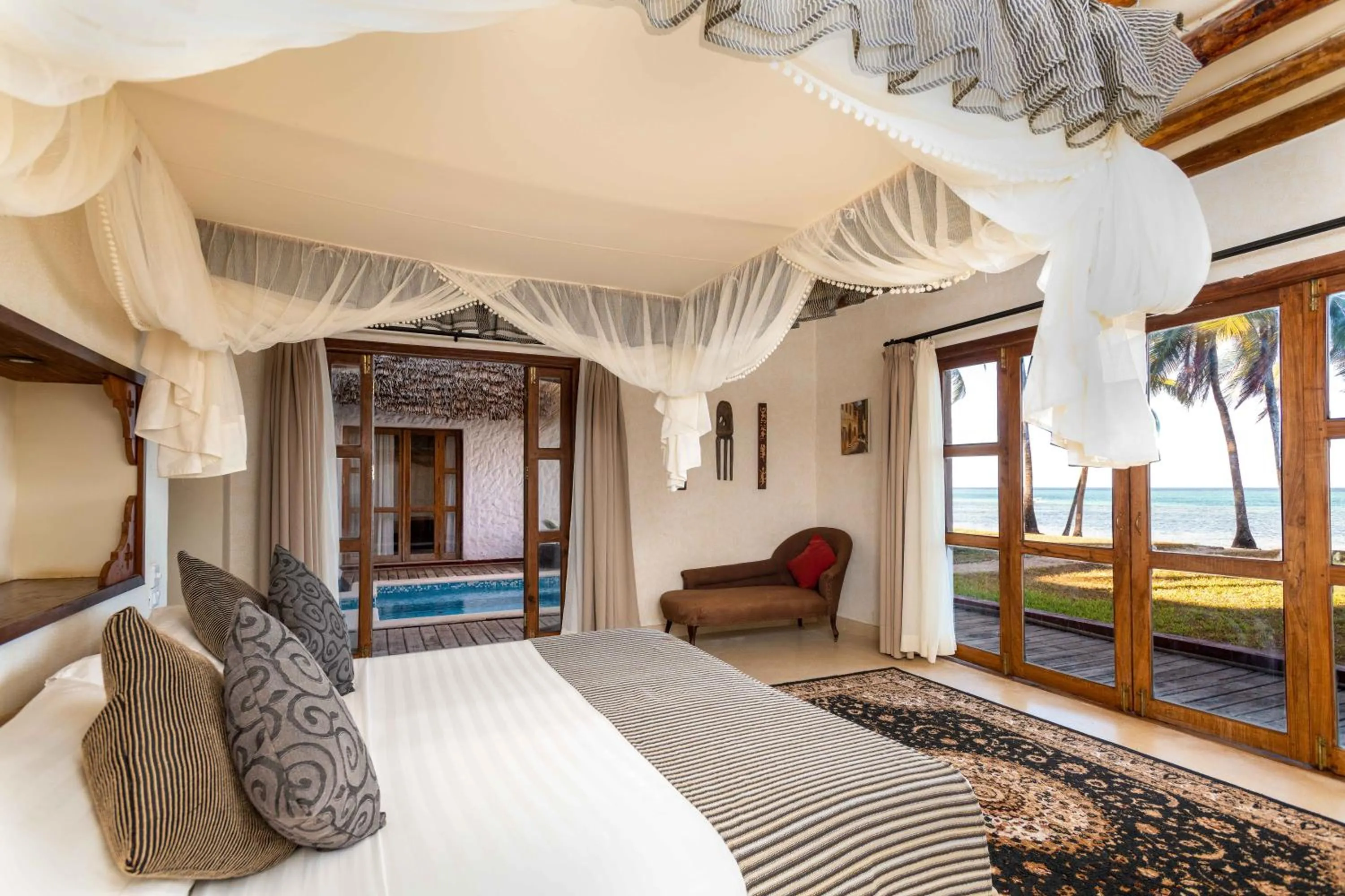 Bed in Karafuu Beach Resort & Spa