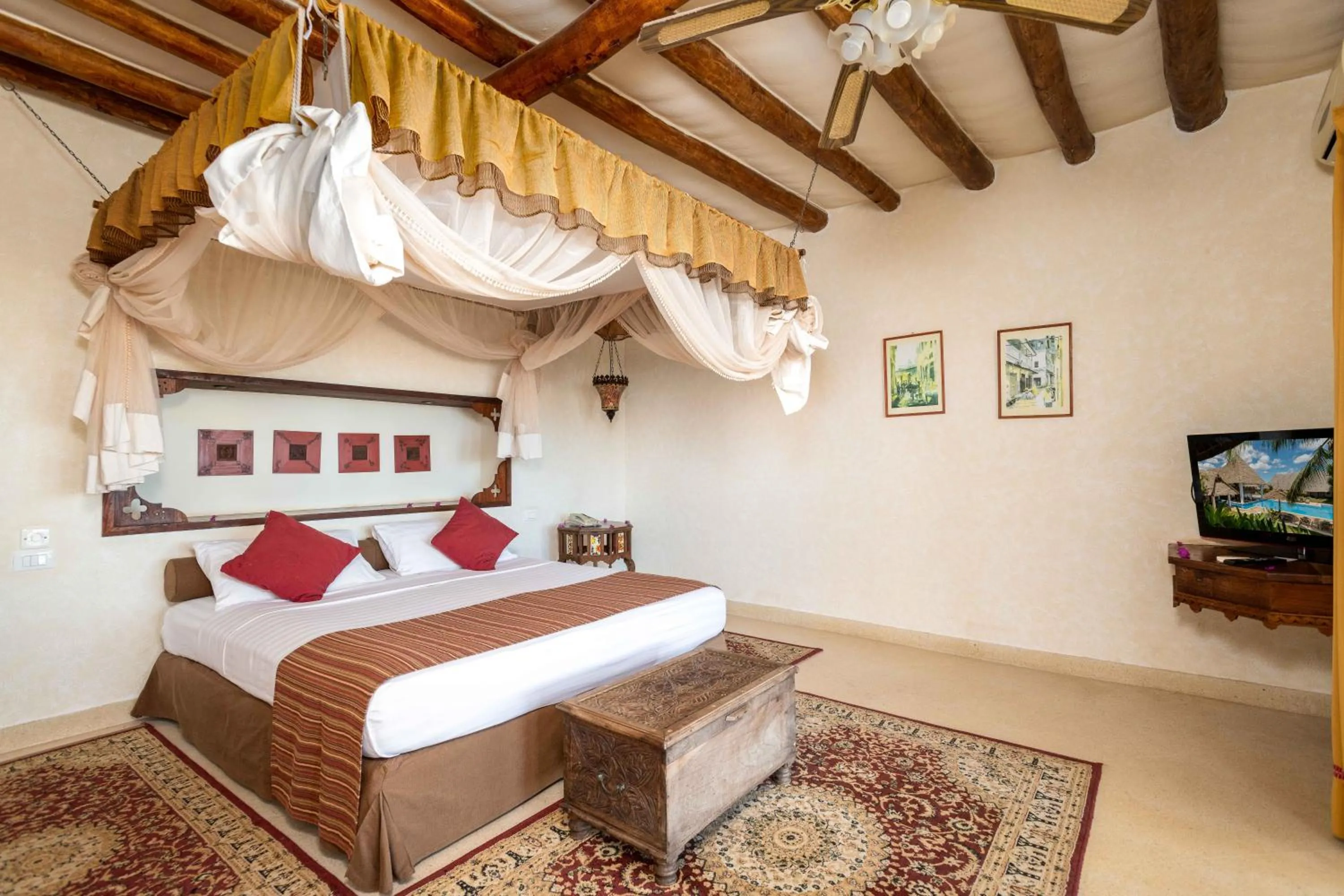 Bed in Karafuu Beach Resort & Spa