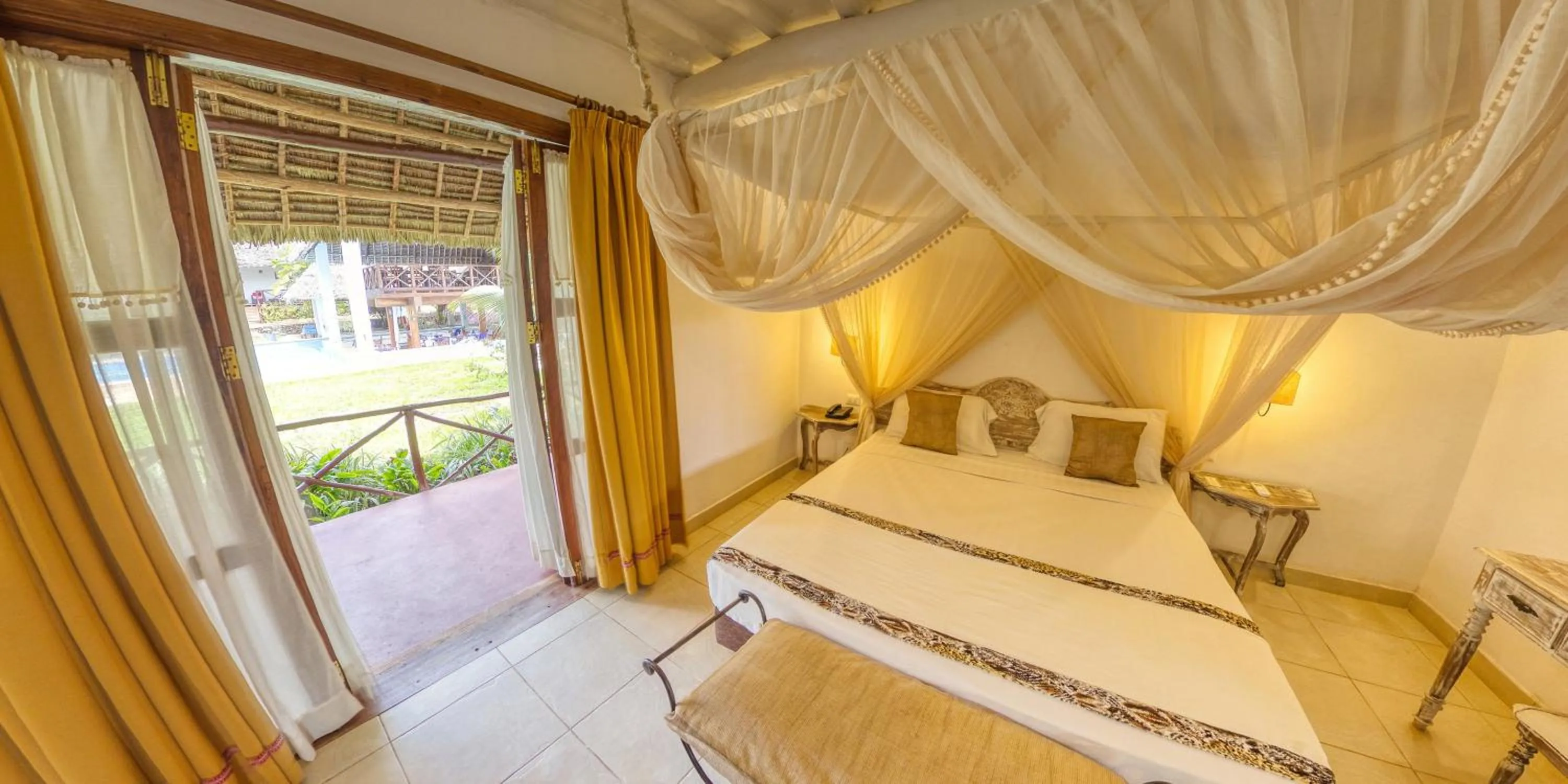 Bed in Karafuu Beach Resort & Spa