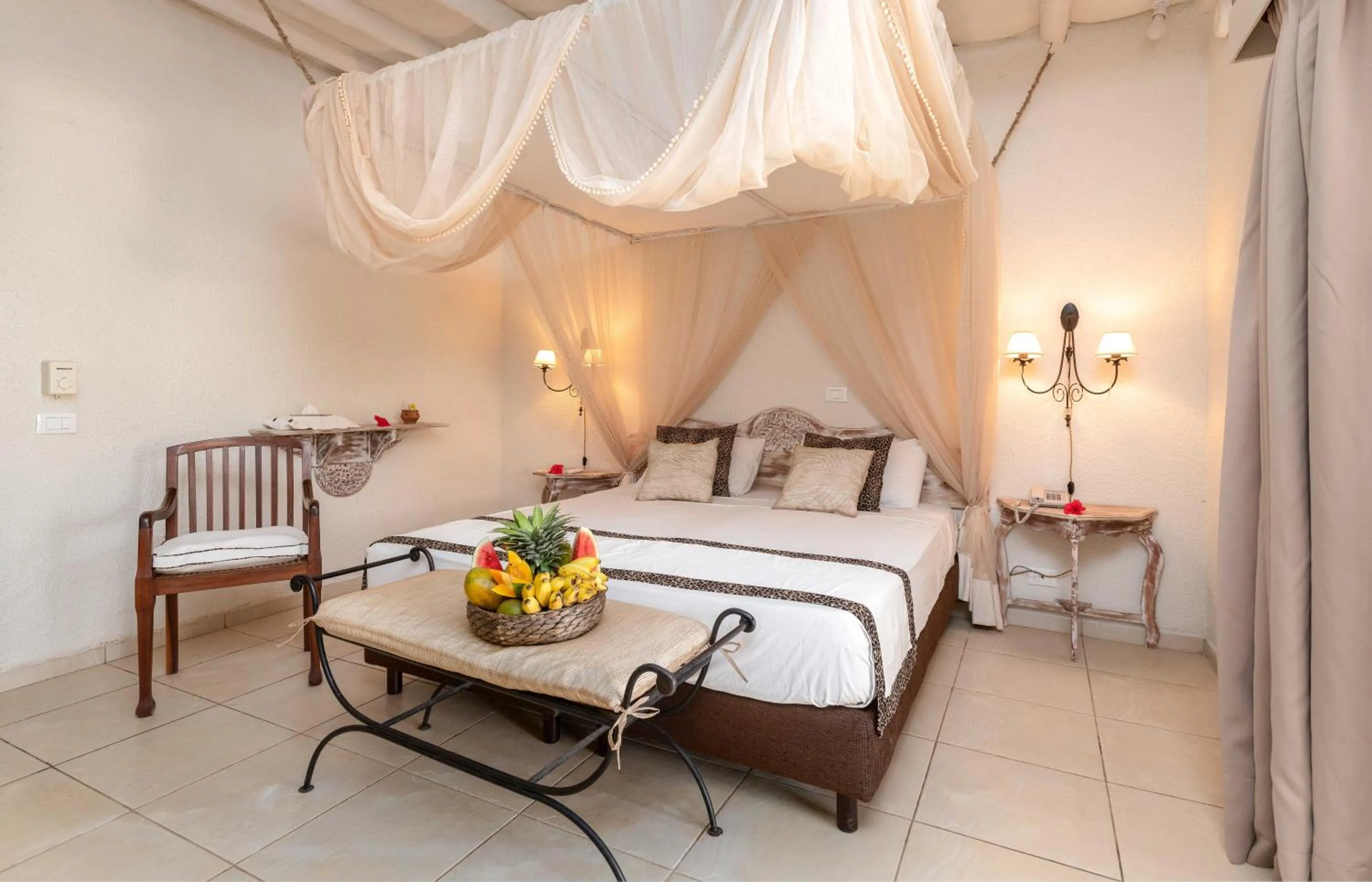 Bed in Karafuu Beach Resort & Spa