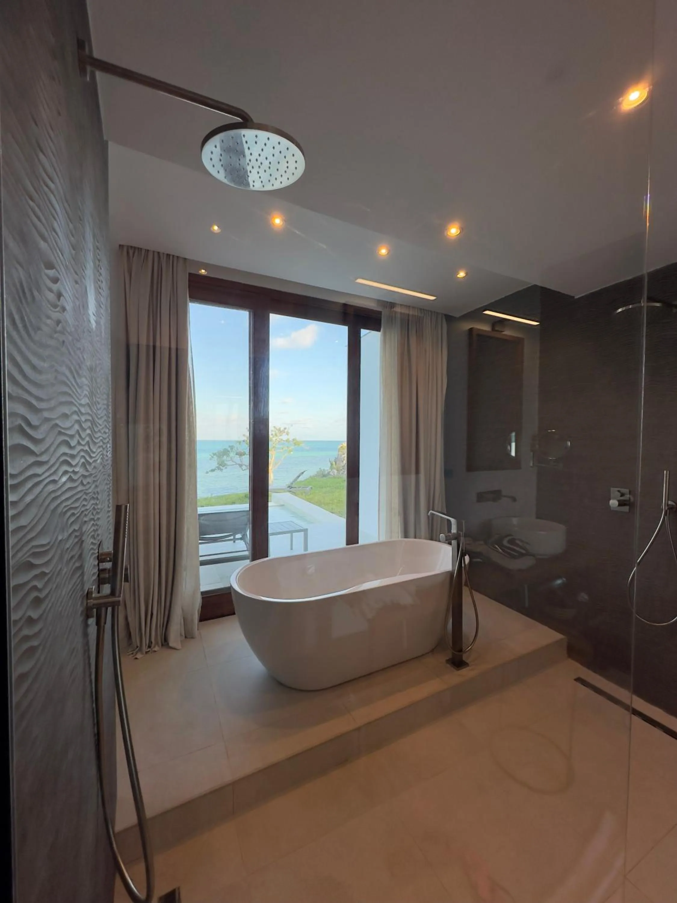 Bed in Karafuu Beach Resort & Spa