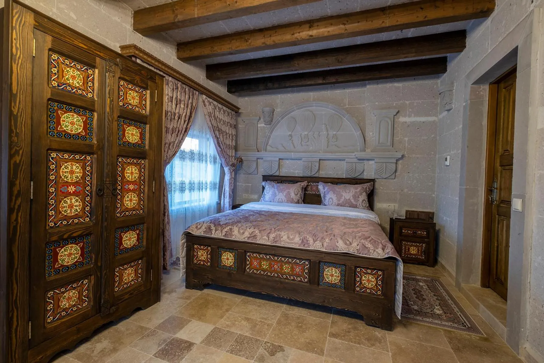 Photo of the whole room, Bed in Underground Cave Suites Hotel