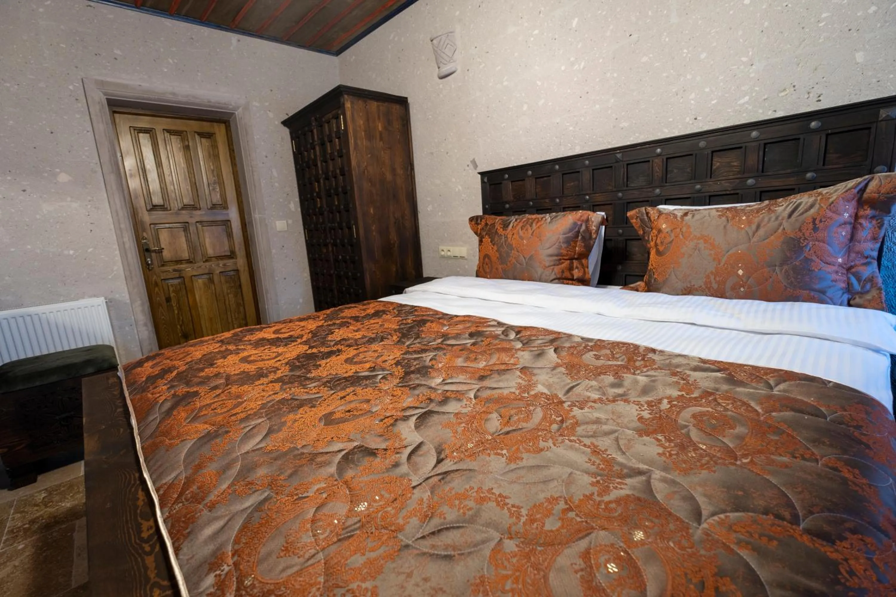 Bed in Underground Cave Suites Hotel