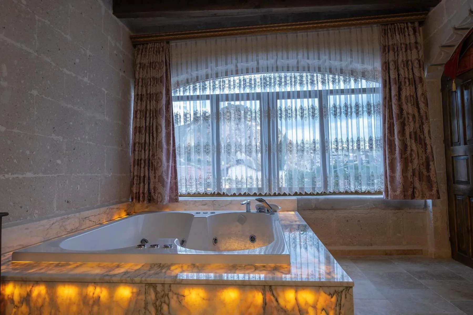 Bath in Underground Cave Suites Hotel