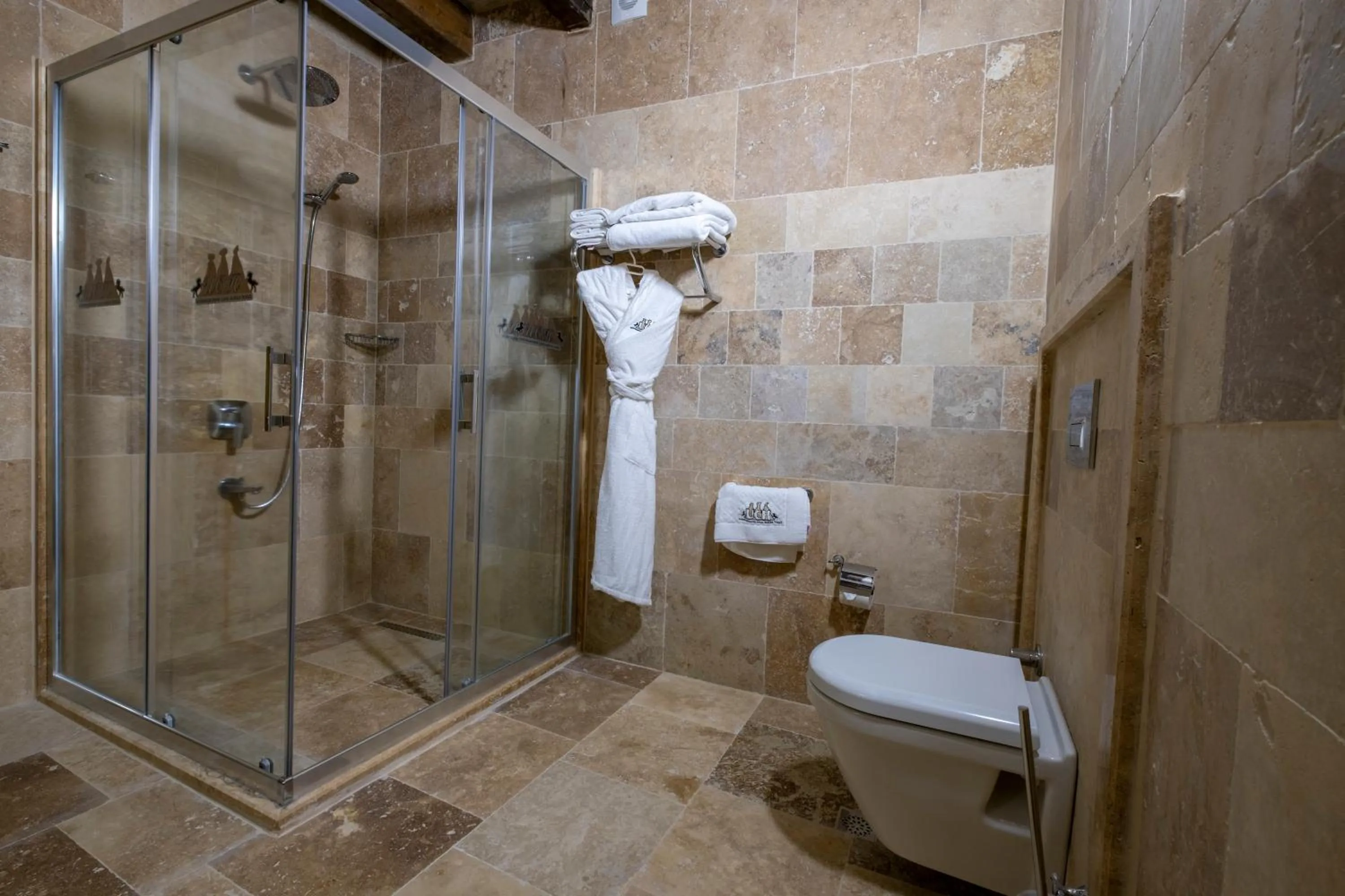 Shower in Underground Cave Suites Hotel