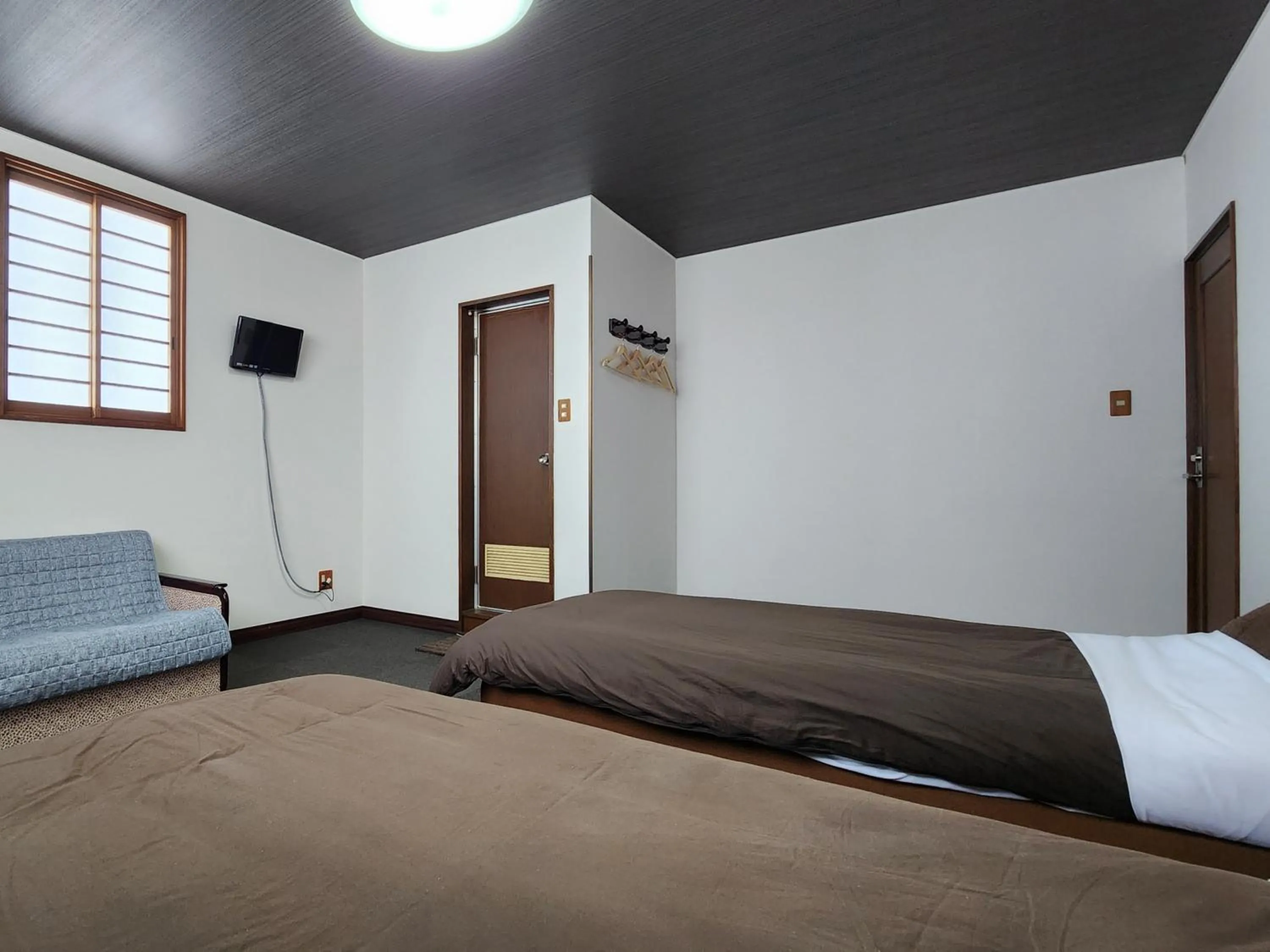 Photo of the whole room, Bed in Pension Kobekko