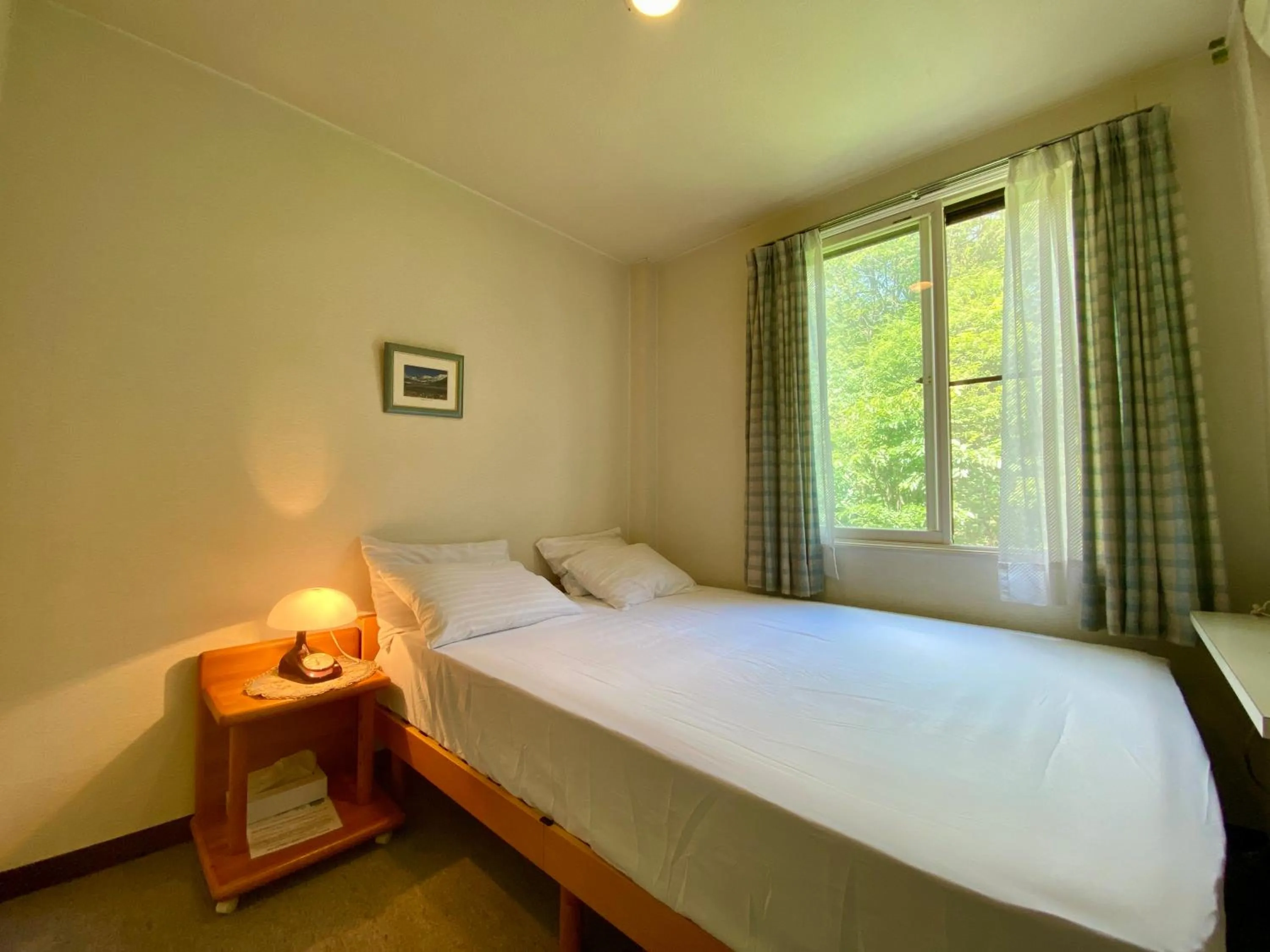 Bed in Hakuba King Hotel
