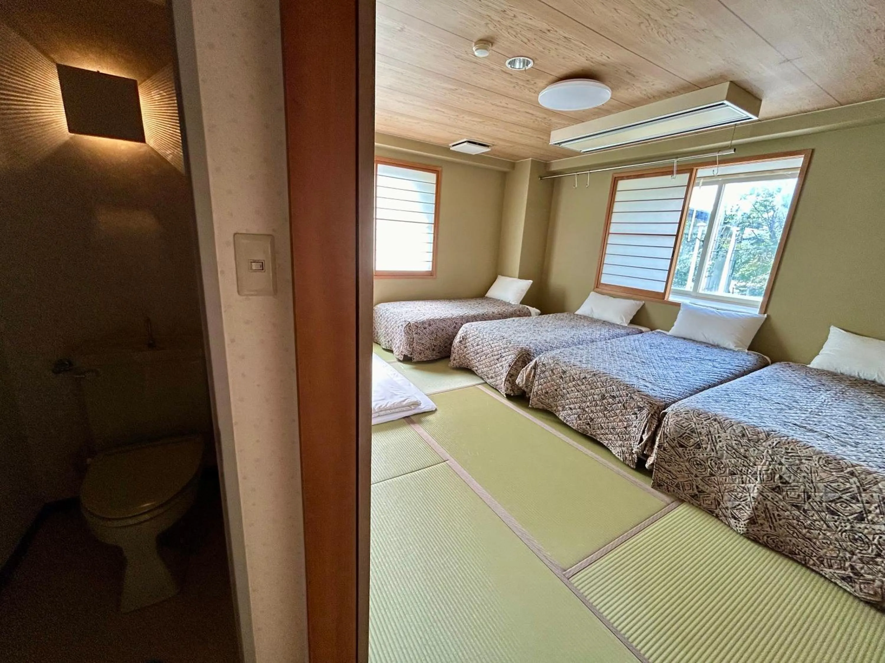 Bed in Hakuba King Hotel