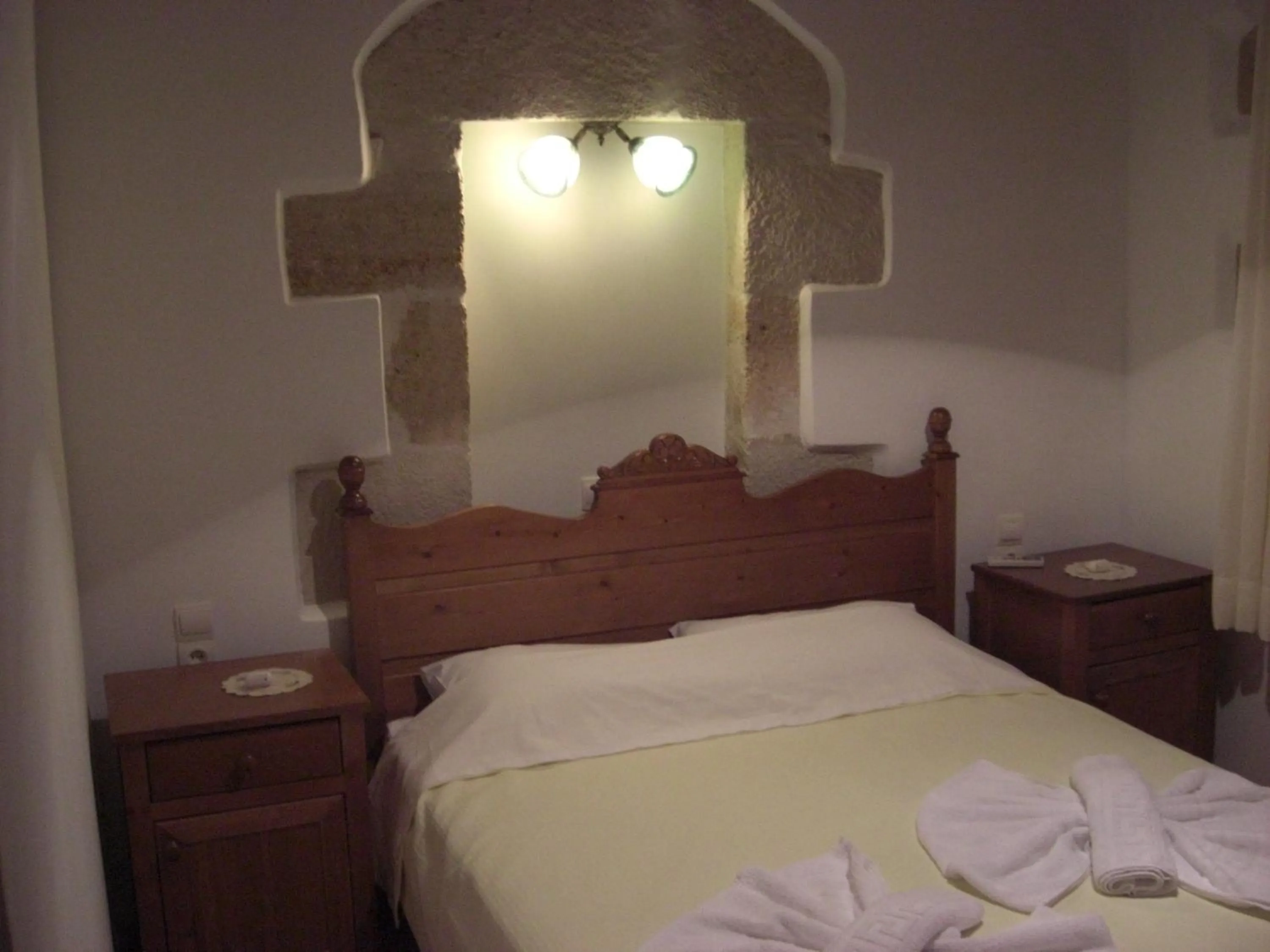 Bed in Patriko Traditional Stone Houses