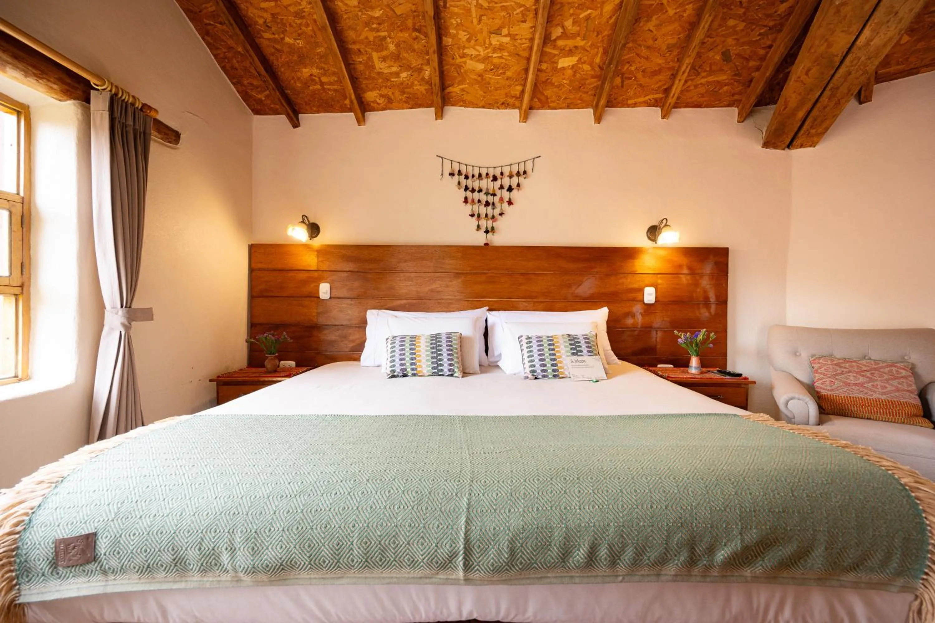 Bed in Unuwasi Hotel & Villa