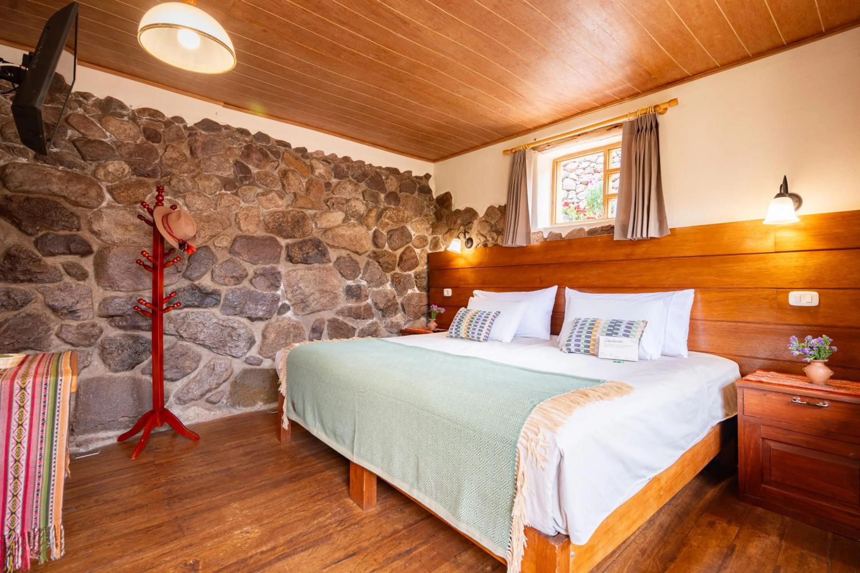 Bed in Unuwasi Hotel & Villa