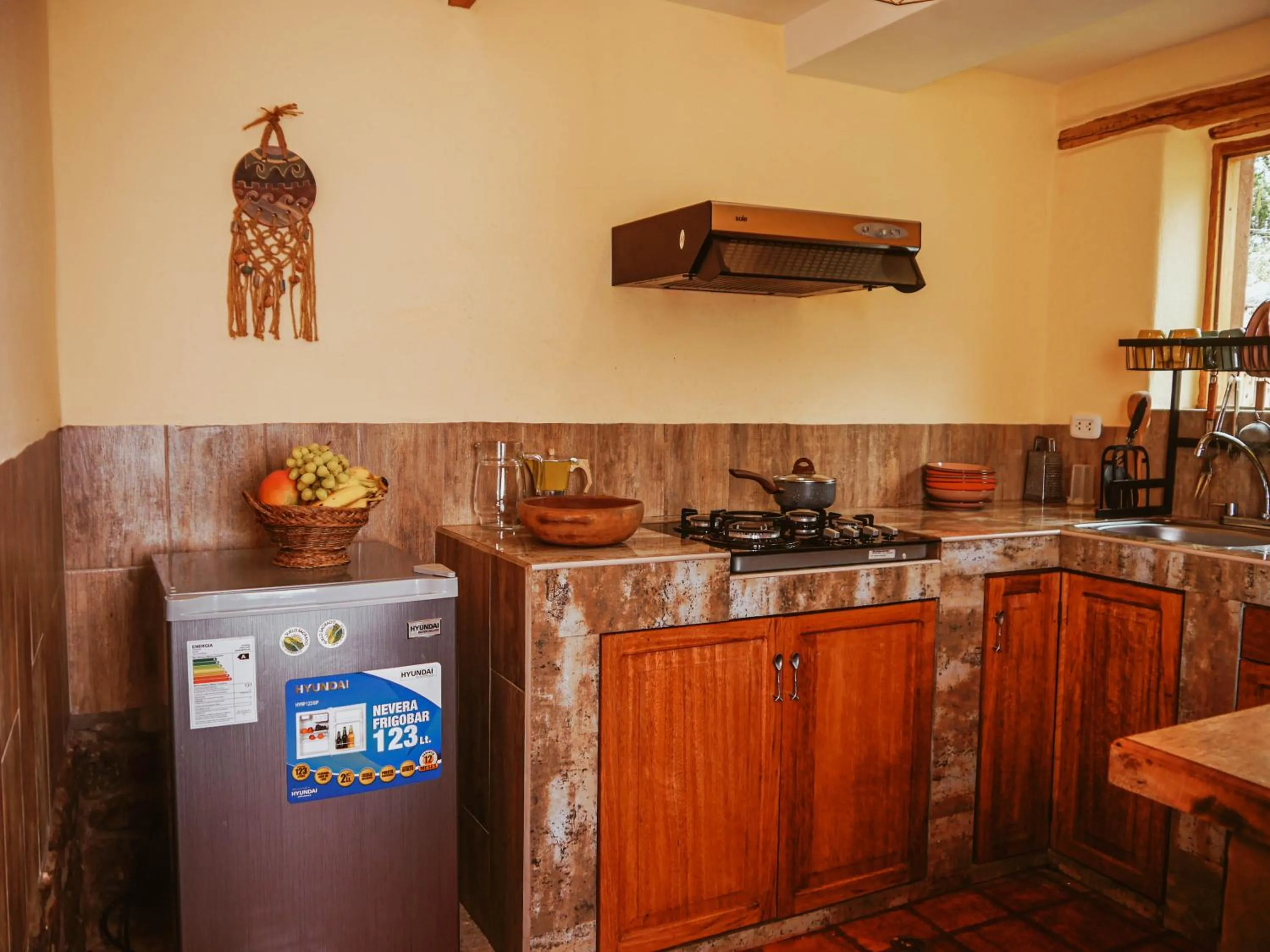 Kitchen or kitchenette in Unuwasi Hotel & Villa