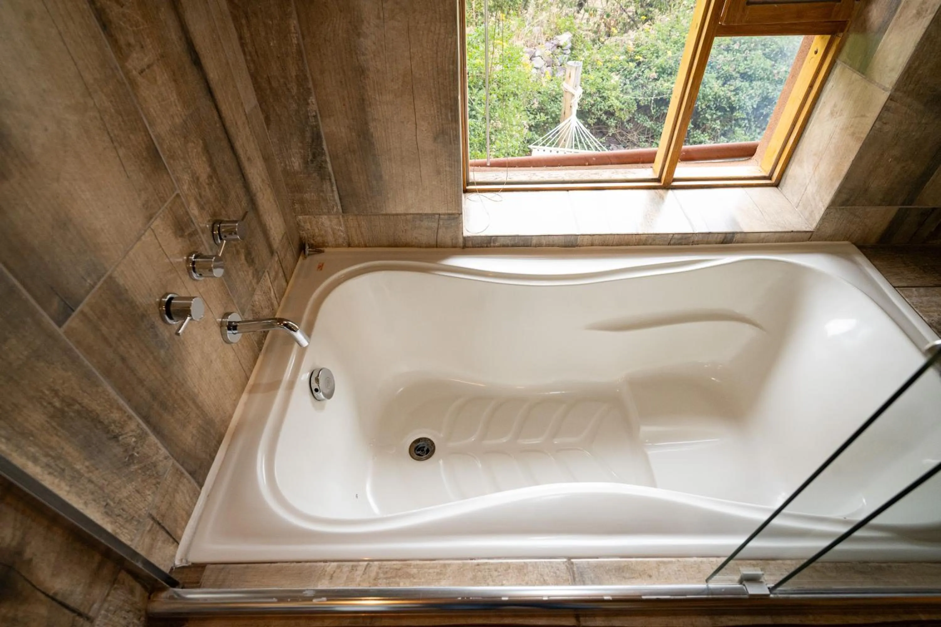 Bathroom in Unuwasi Hotel & Villa
