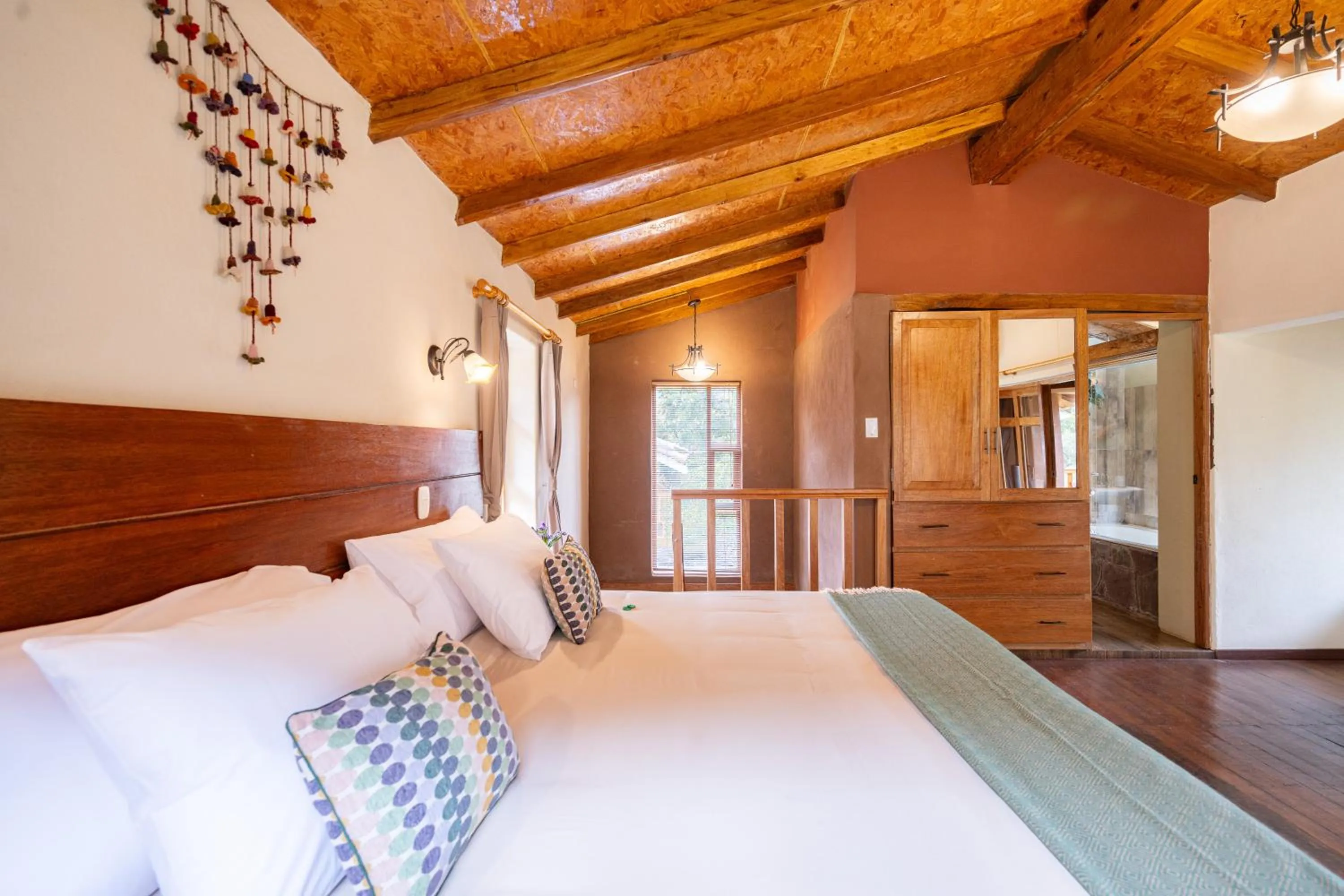 Bed in Unuwasi Hotel & Villa