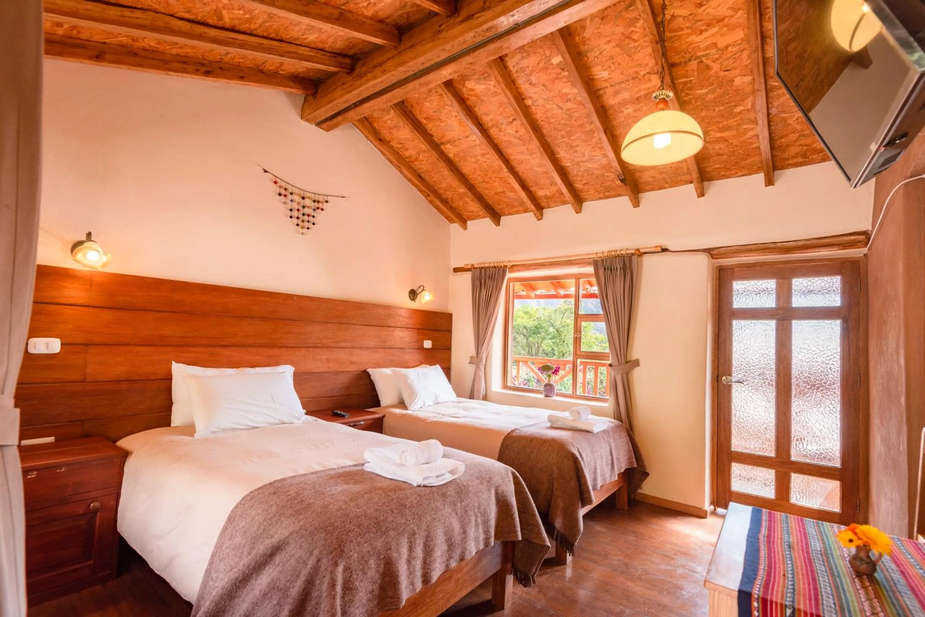 Photo of the whole room, Bed in Unuwasi Hotel & Villa