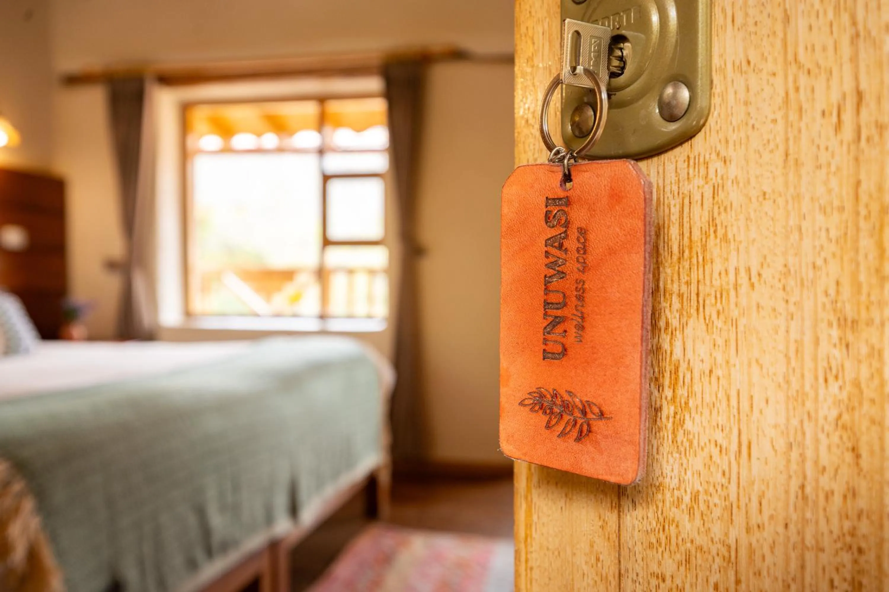 Bed in Unuwasi Hotel & Villa