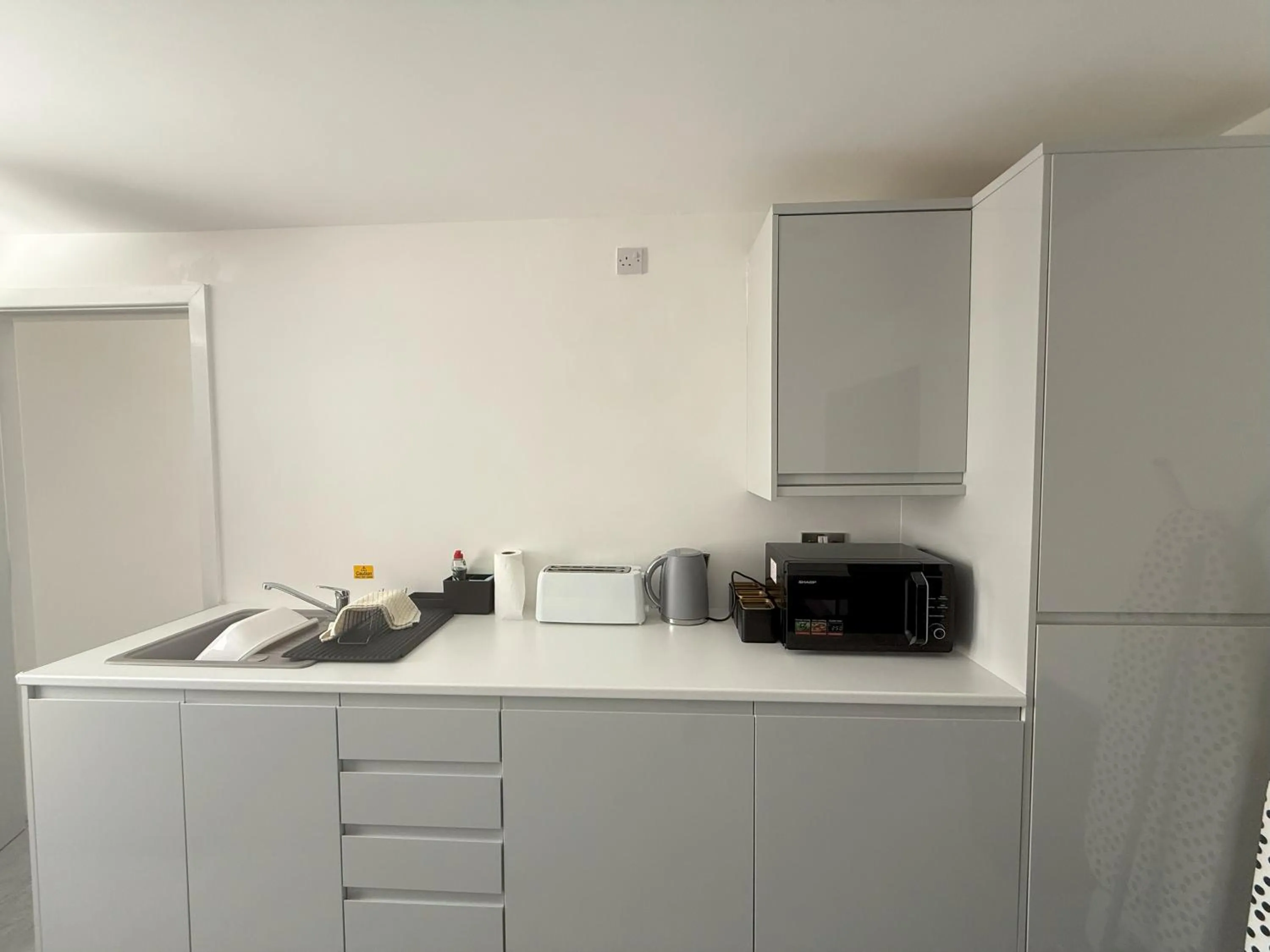 Kitchen or kitchenette in Coastal Plaza