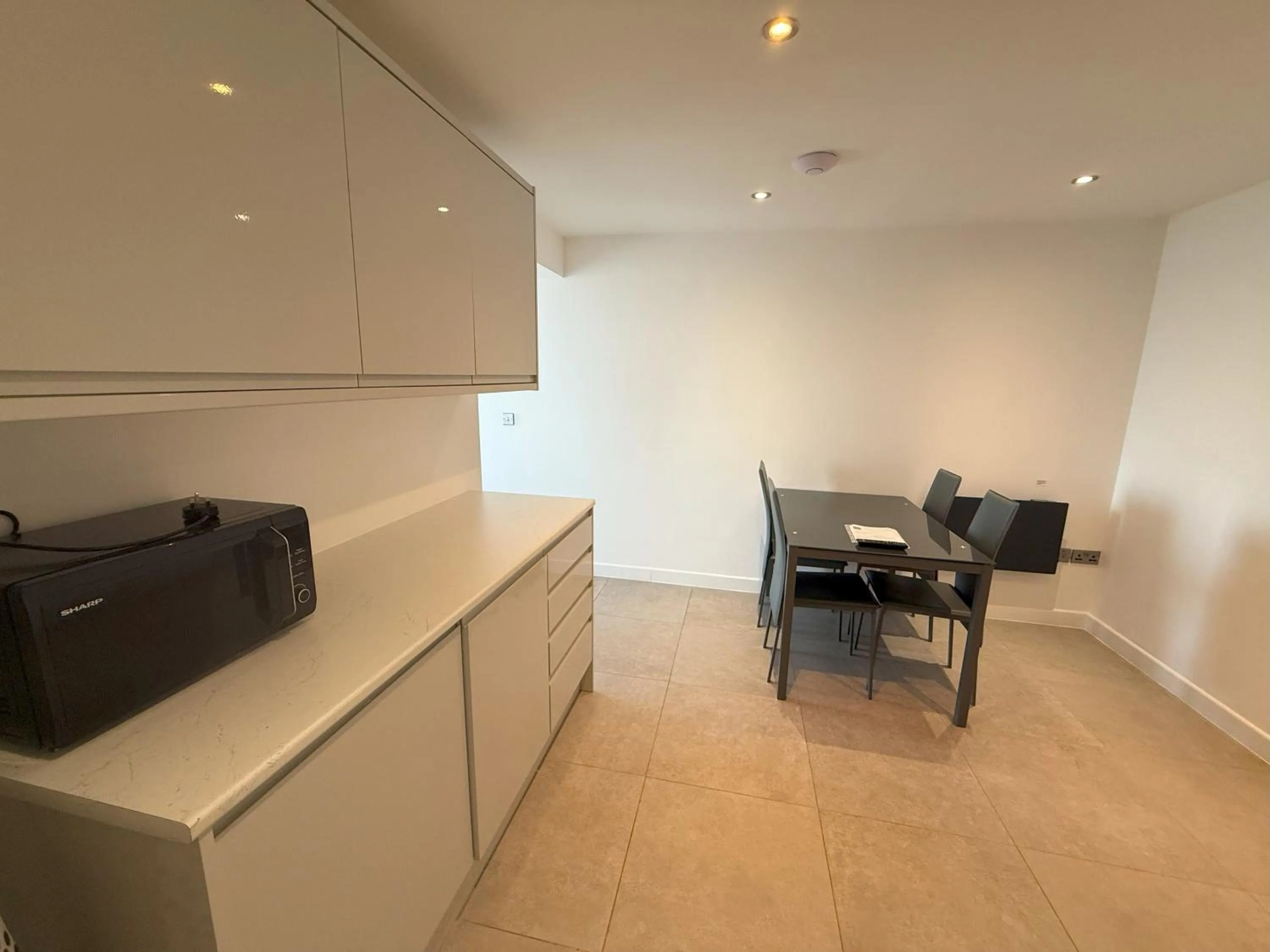 Kitchen or kitchenette in Coastal Plaza