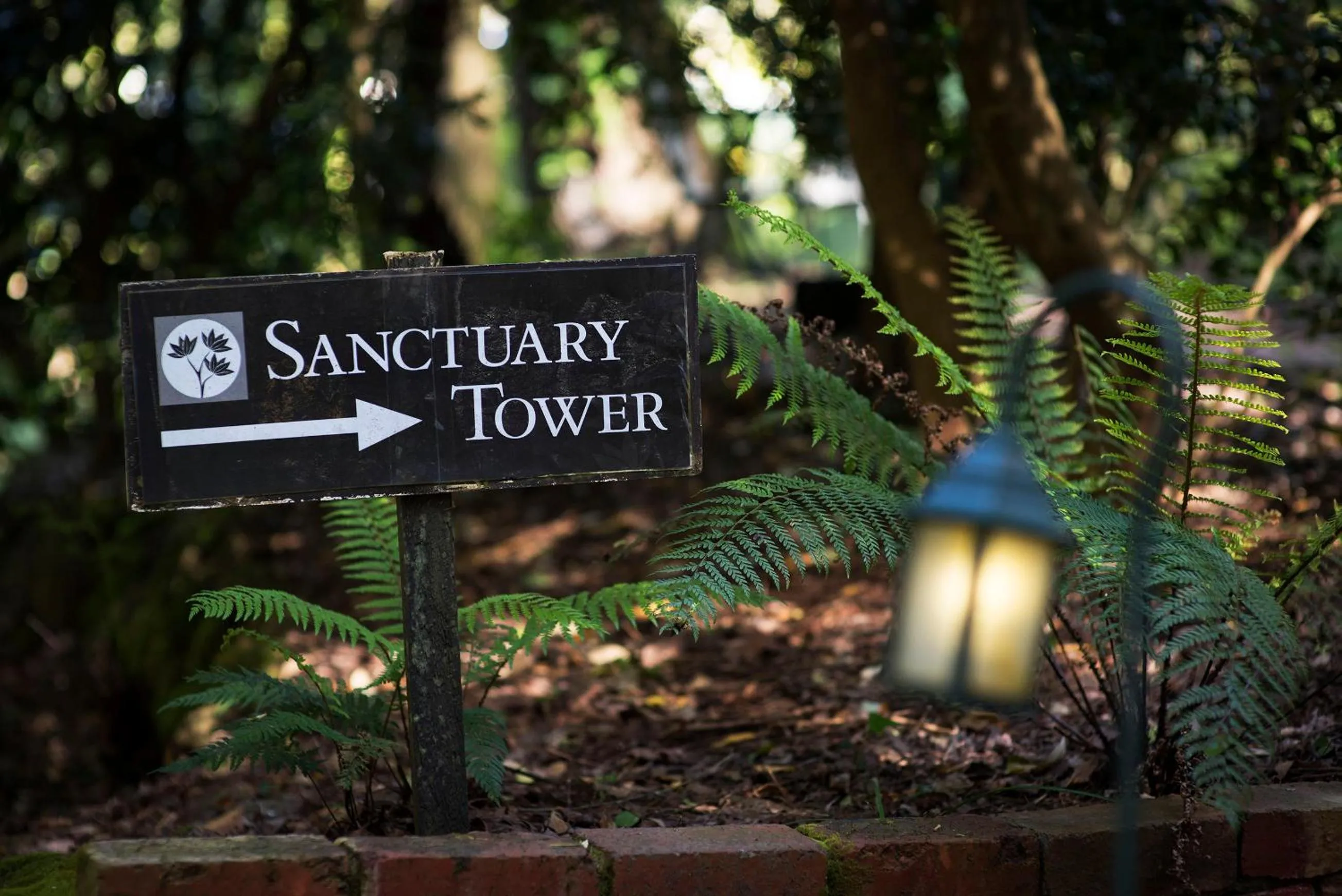 Property logo or sign in Linden Gardens Rainforest Retreat