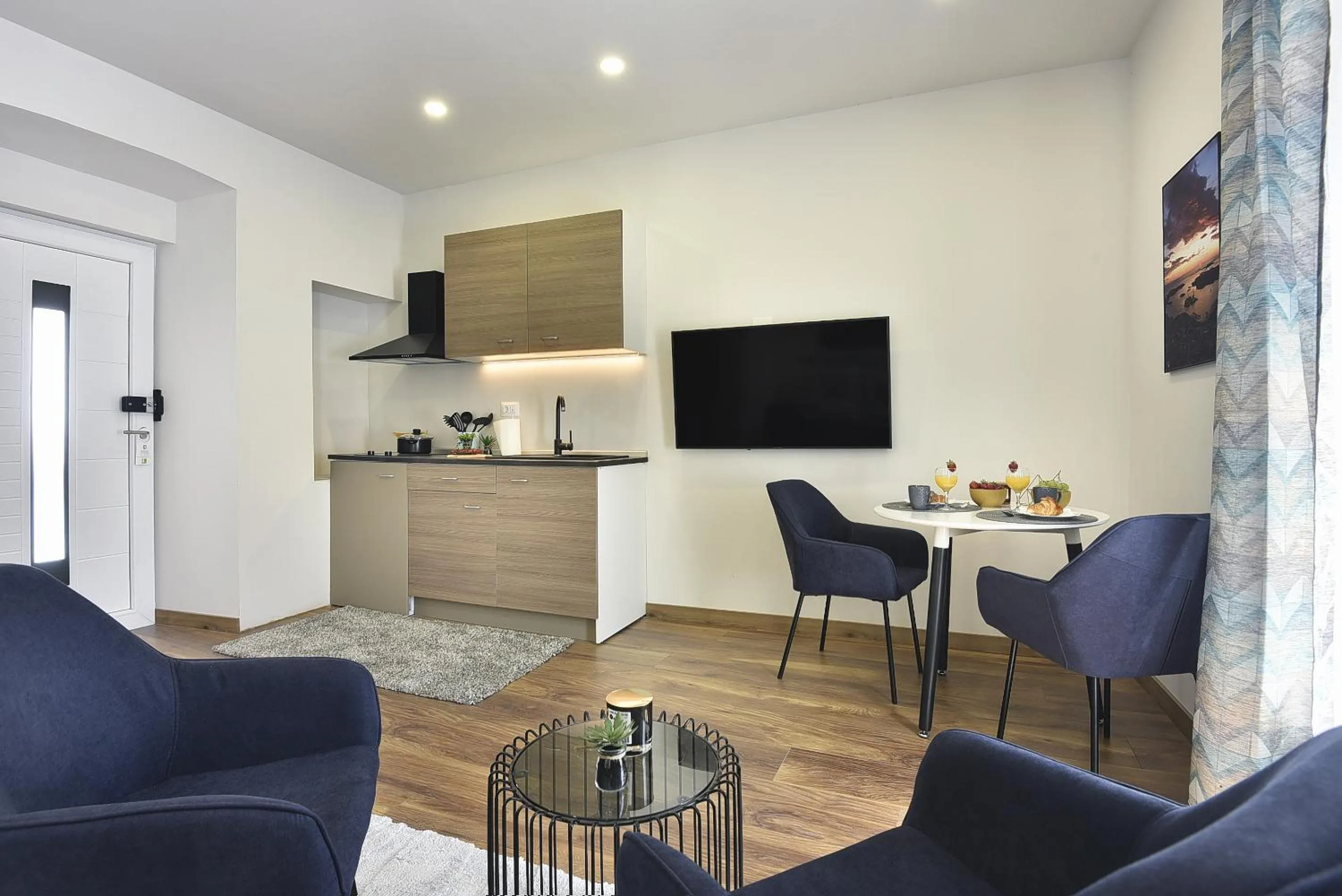 TV and multimedia in D&A Central Luxury Apartments with FREE Parking