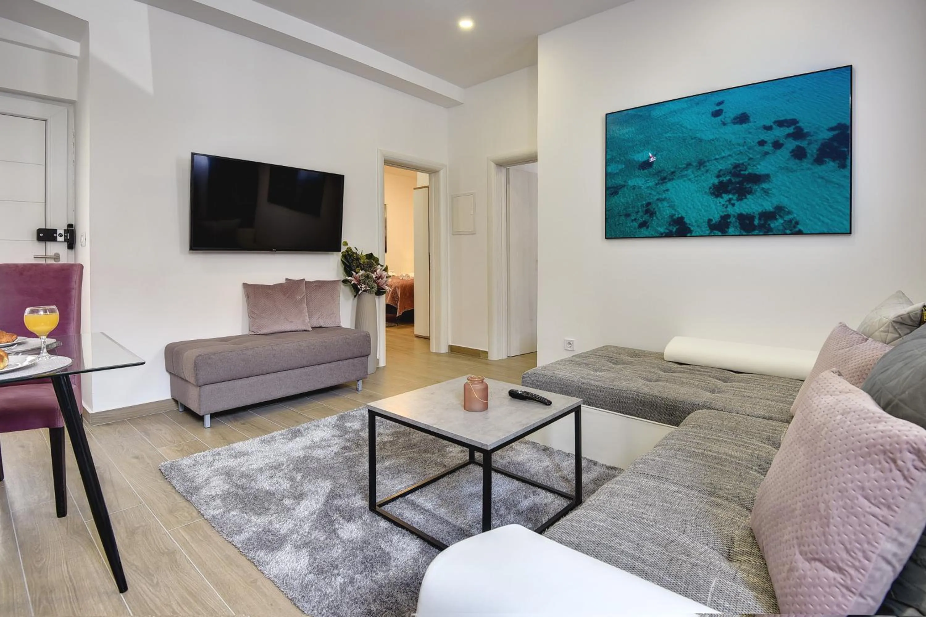 TV and multimedia in D&A Central Luxury Apartments with FREE Parking