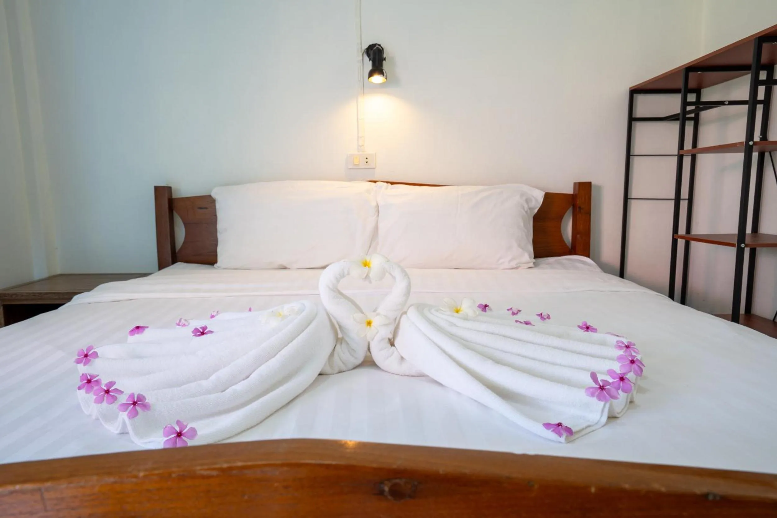 Bed in Isara Lanta Beach Resort