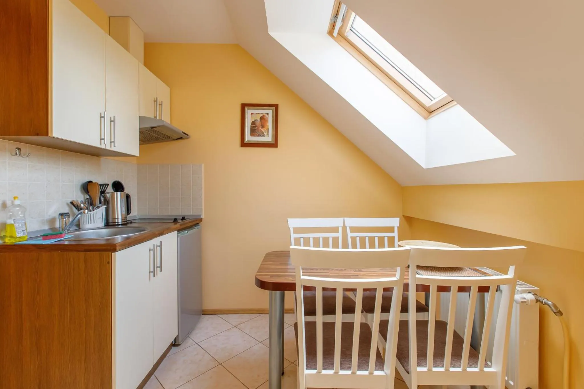 Kitchen or kitchenette in Viešbutis Prie Fontano