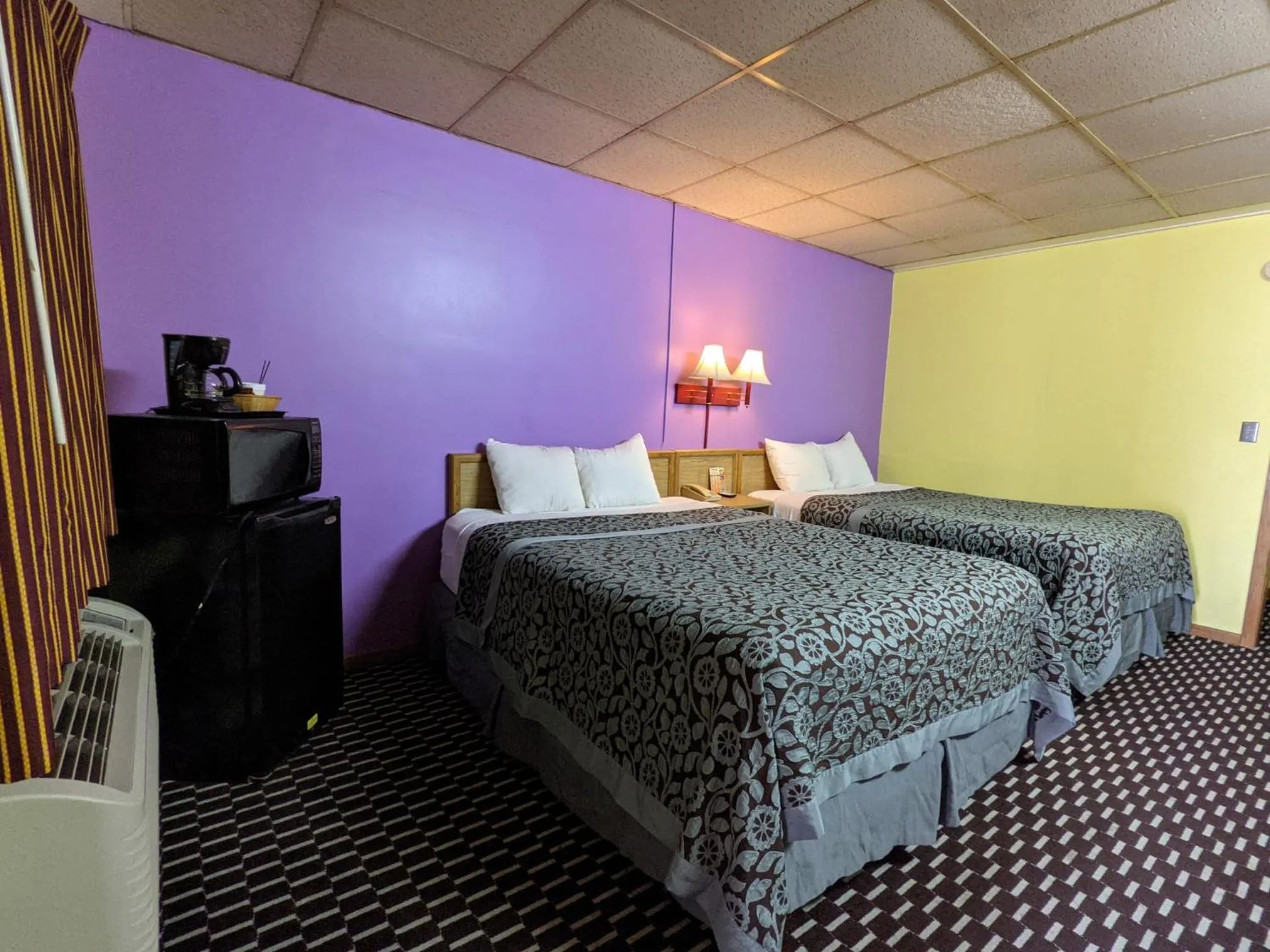 Bed in Great Plains Budget Inn