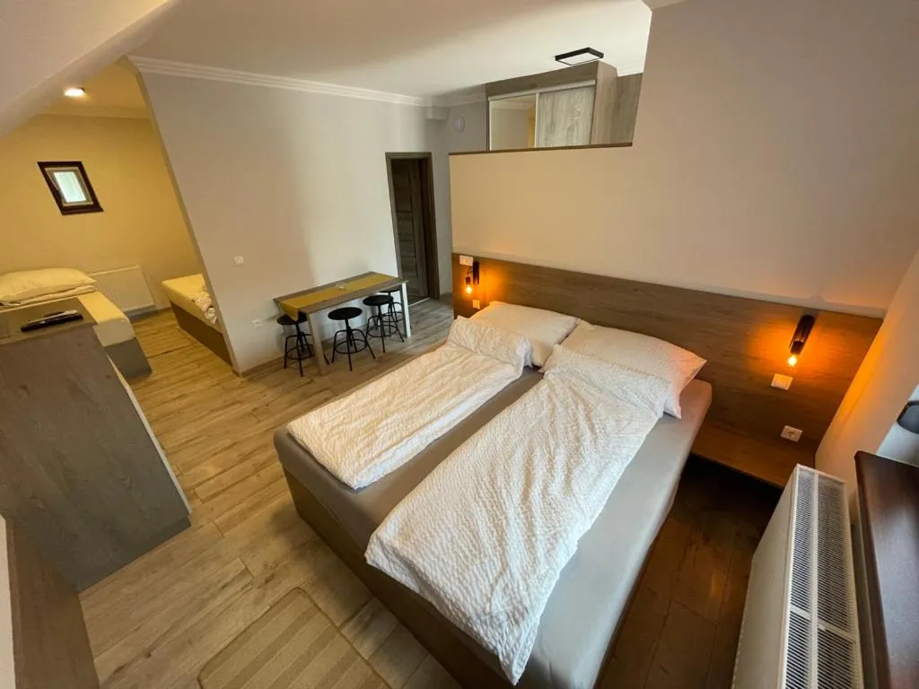 Bed in Kukorica Csárda Apartman