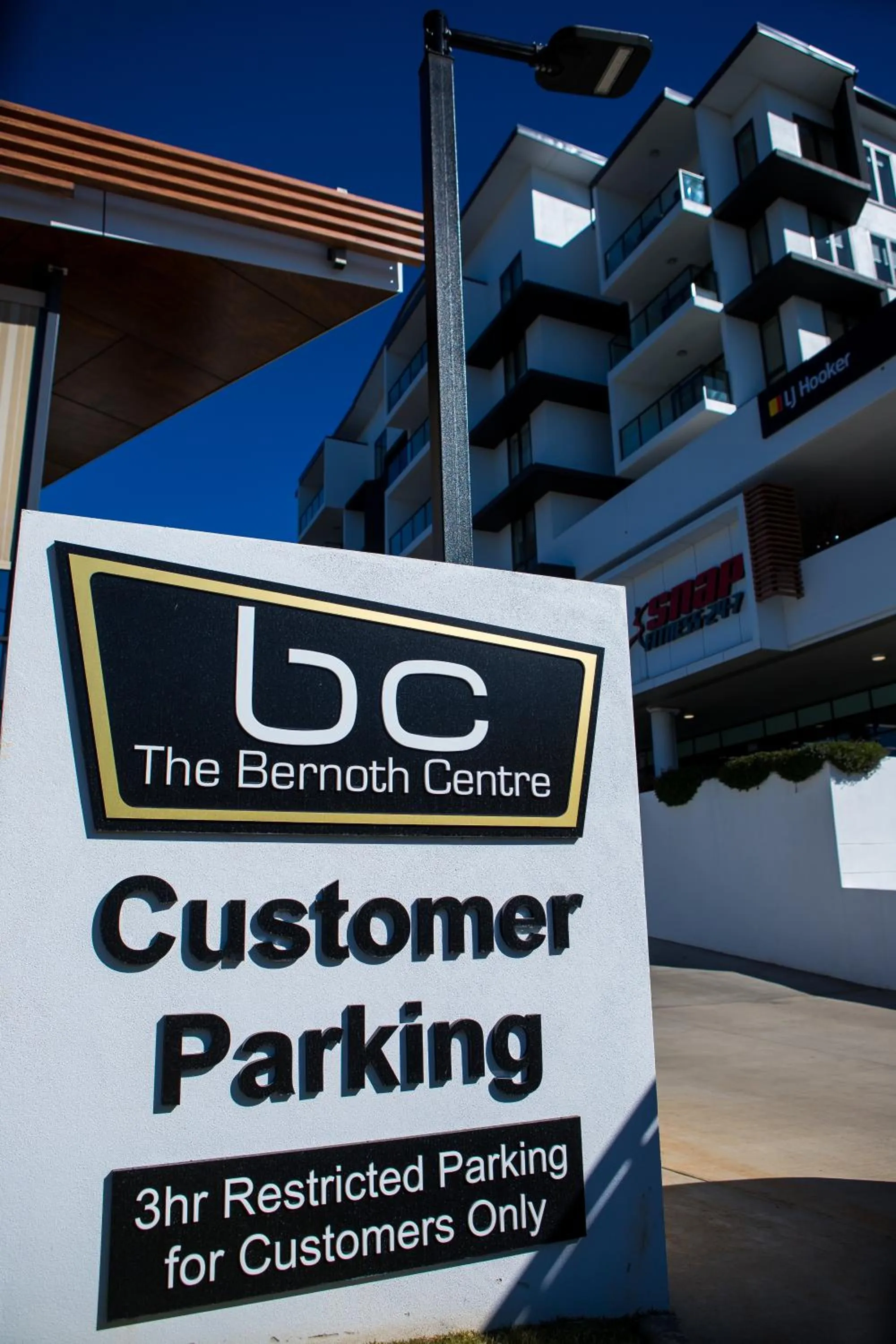 Property logo or sign in Inspire Boutique Apartments