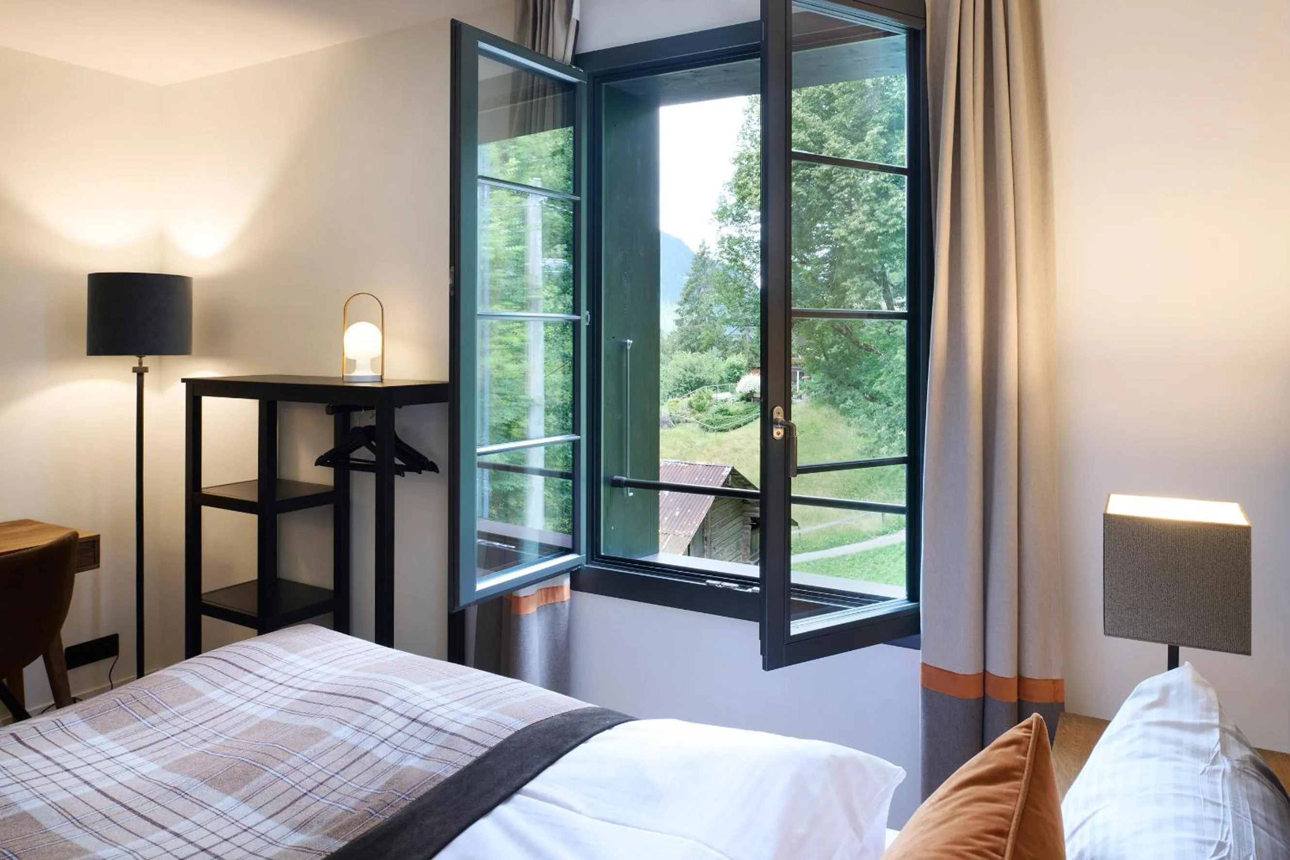 Photo of the whole room, Bed in Eiger View Alpine Lodge