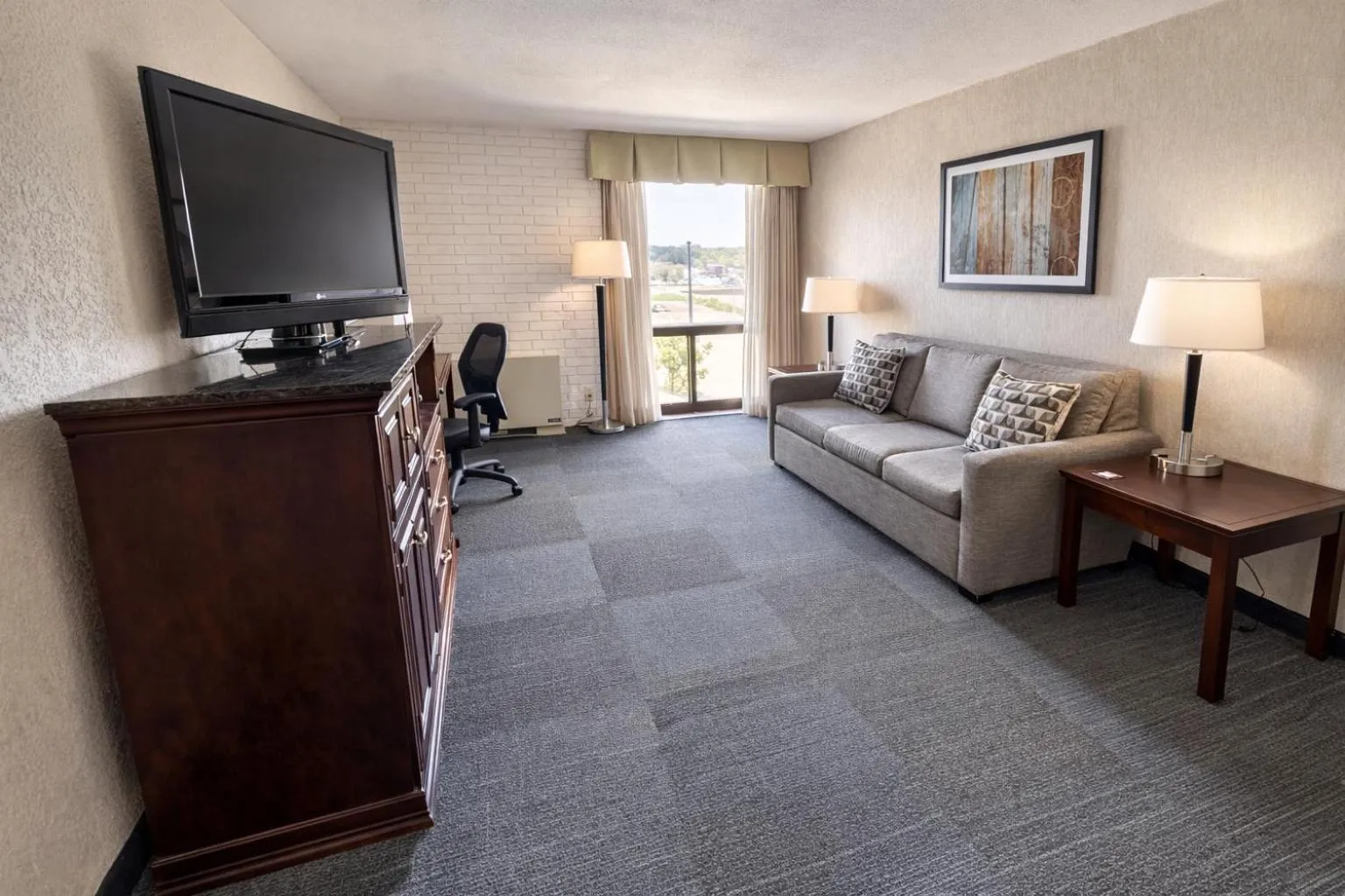 Living room in Hotel Lotus Kansas City Stadium